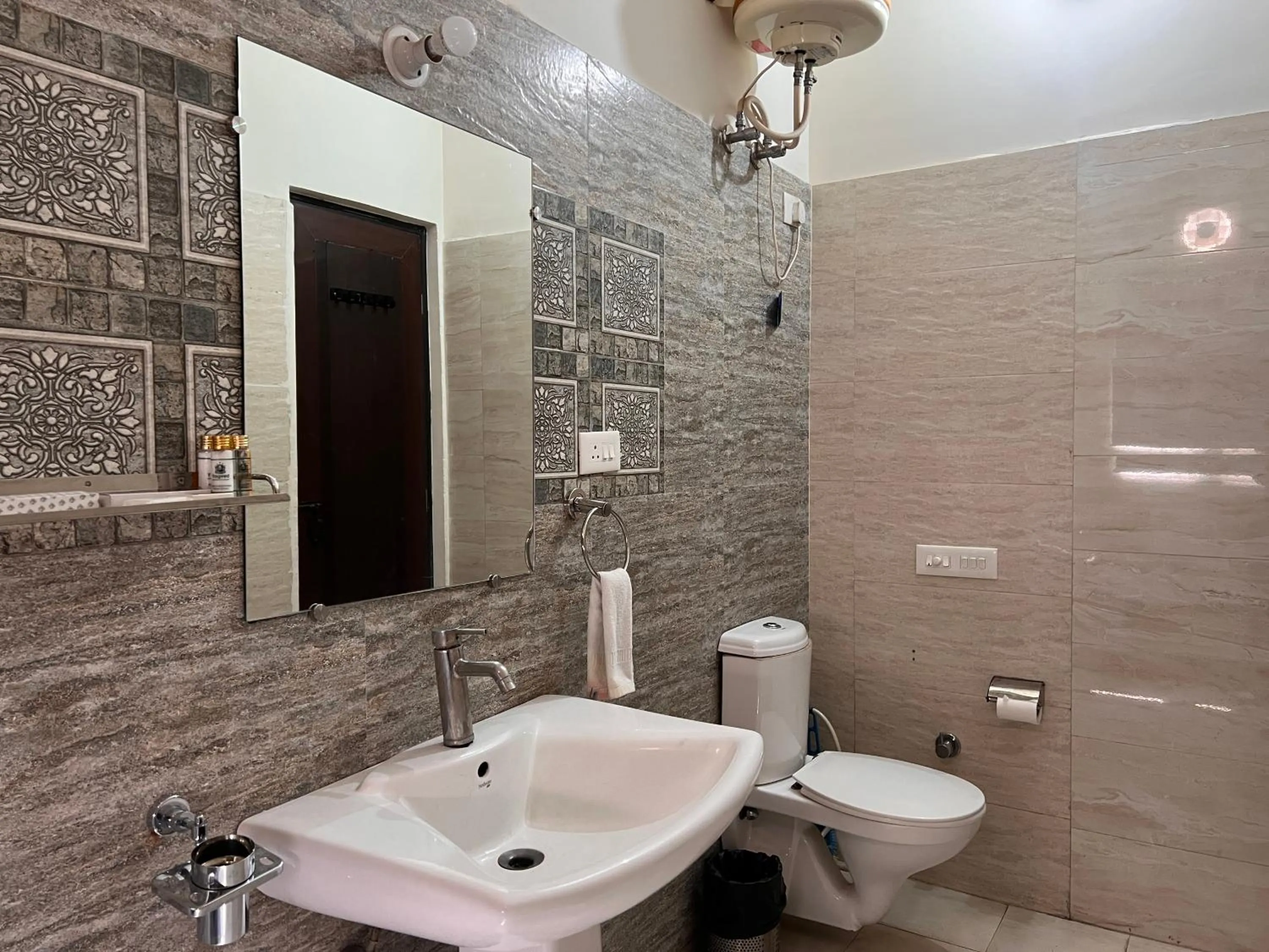 Toilet in Yogved Hospitality & Resort