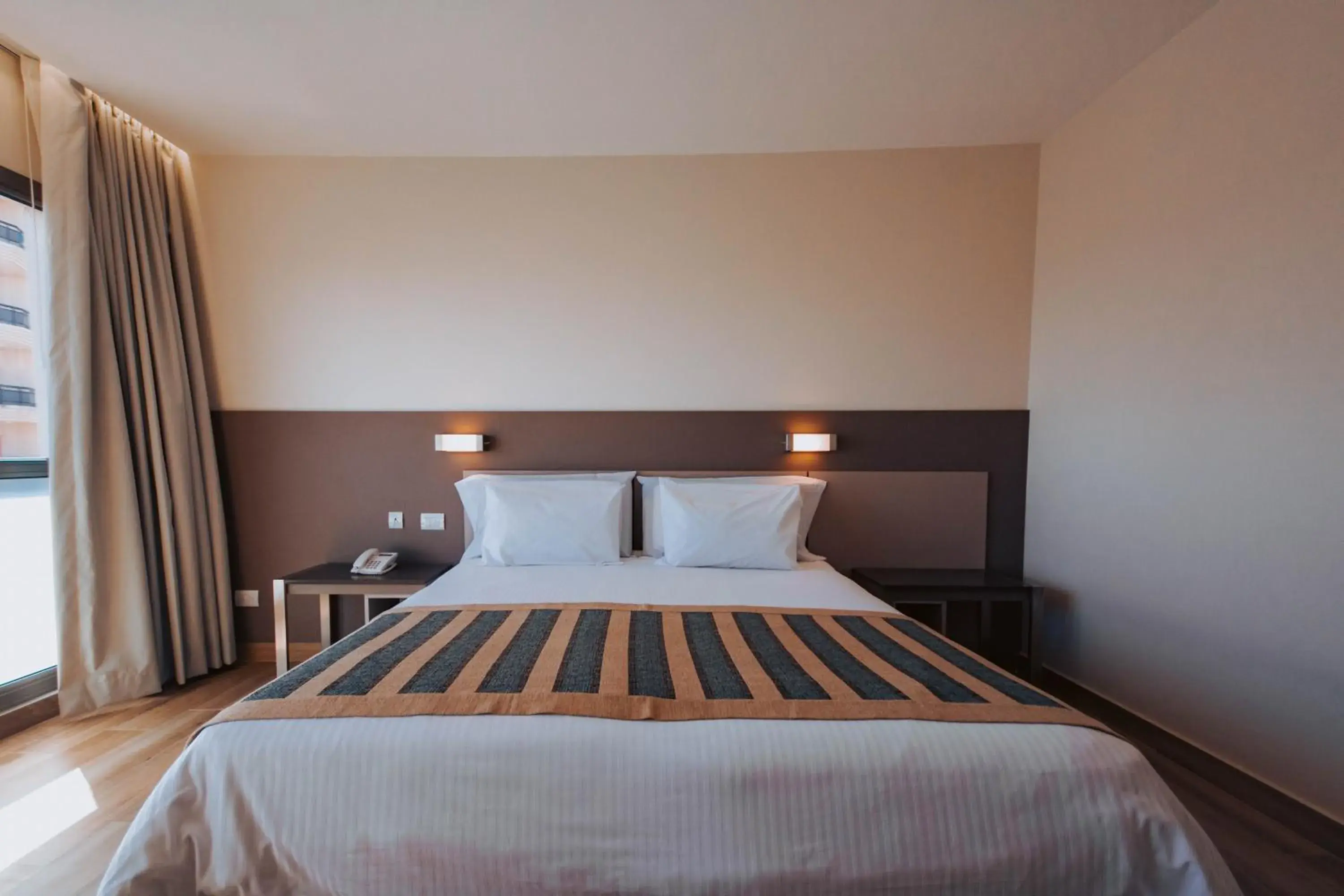 Bed in SEC Hotel Bed in SEC Hotel