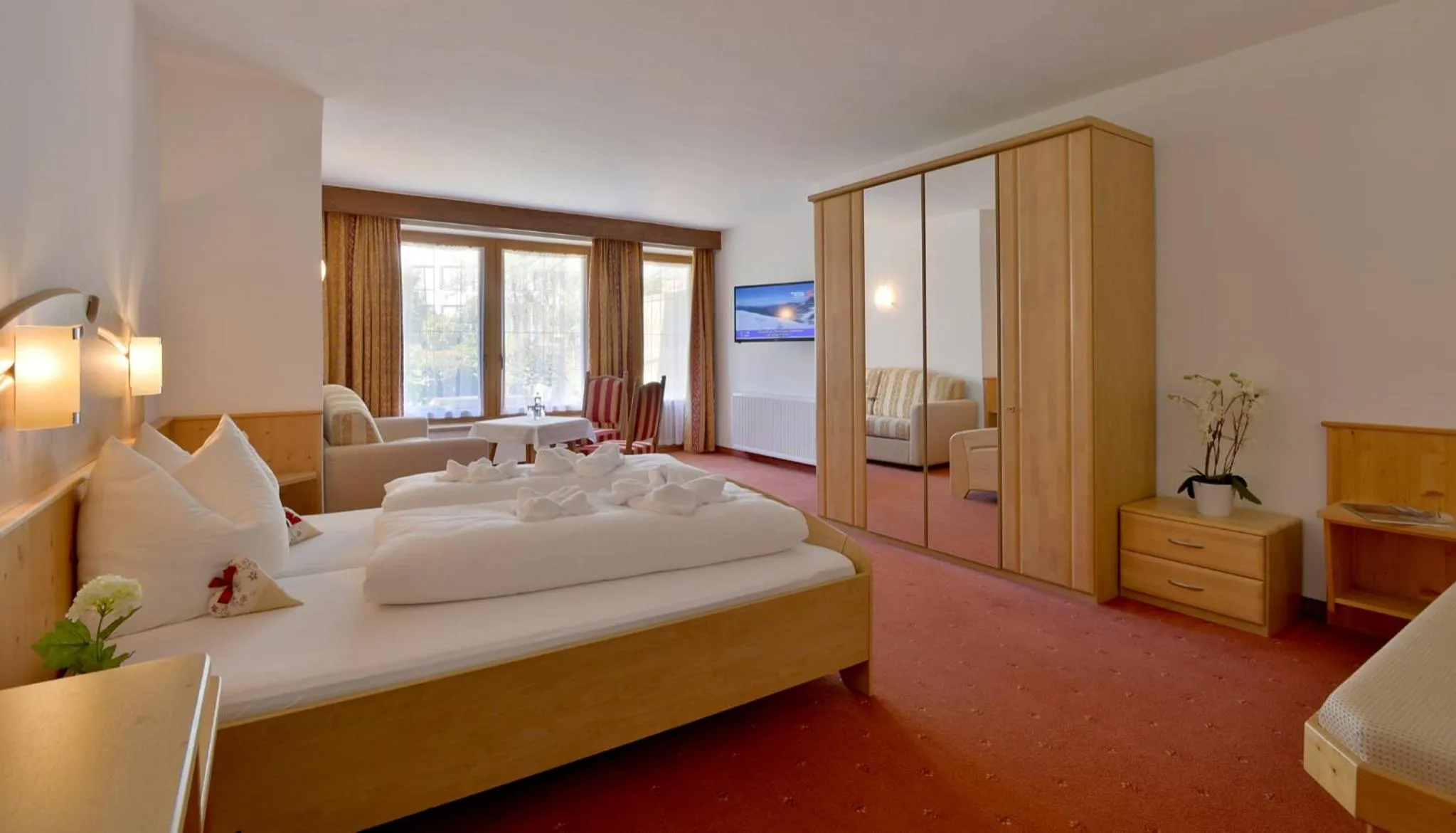 Photo of the whole room, Bed in Posthotel Mayrhofen