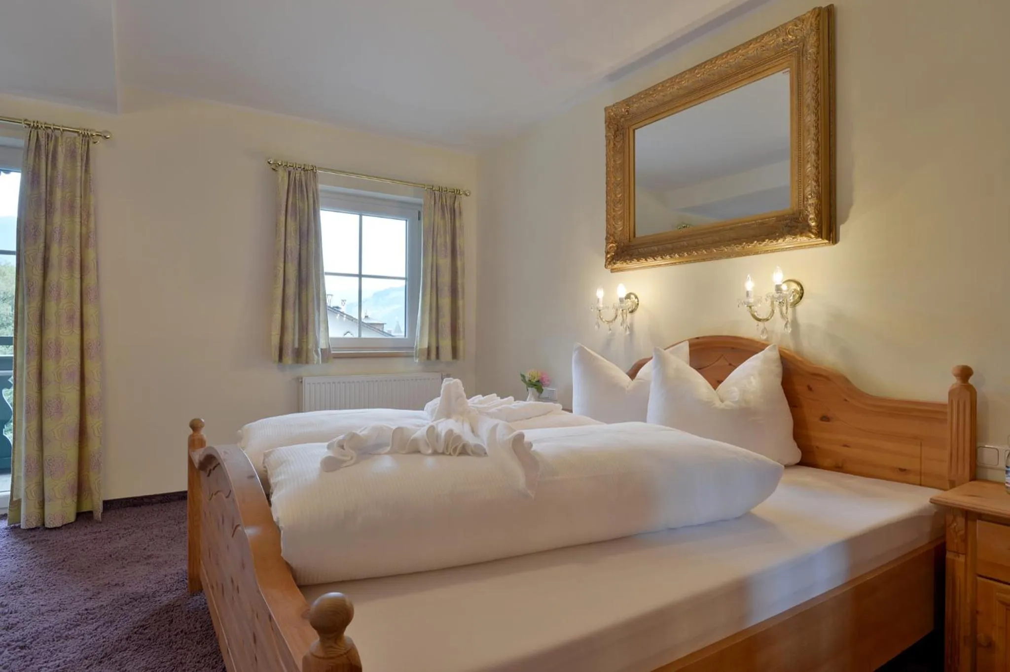 Photo of the whole room, Bed in Posthotel Mayrhofen