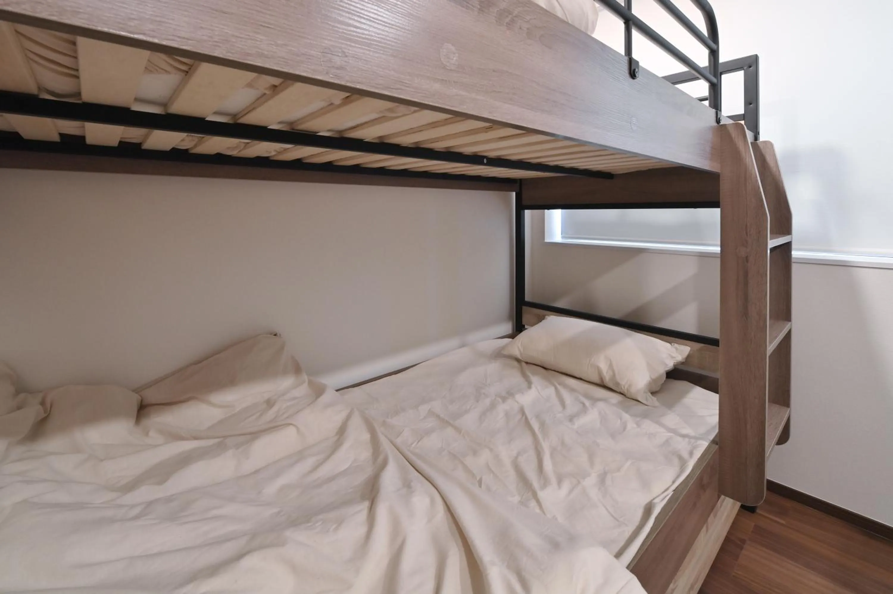 Bed in Stylewood Nishi-Shinjuku by Tranova