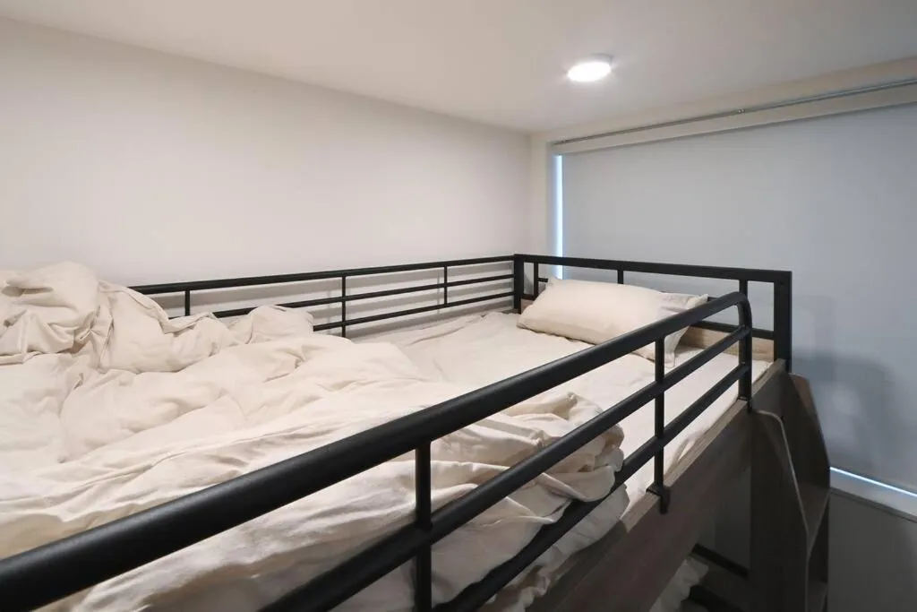 Bed in Stylewood Nishi-Shinjuku by Tranova