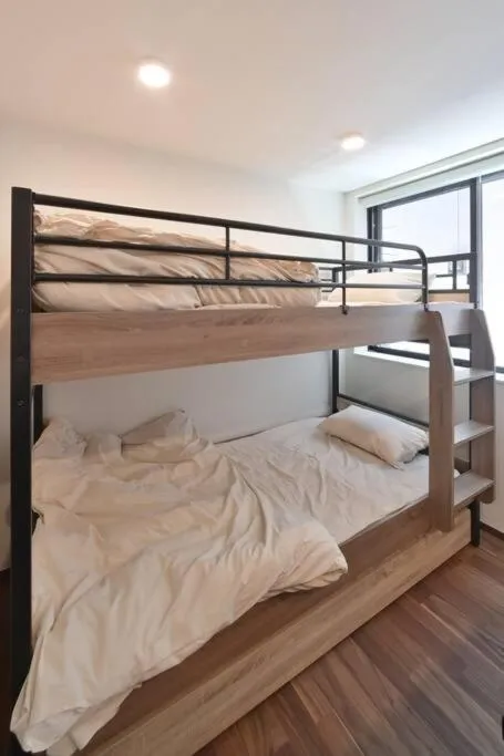 Bed in Stylewood Nishi-Shinjuku by Tranova