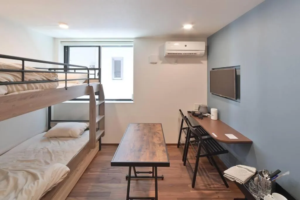 Bed in Stylewood Nishi-Shinjuku by Tranova