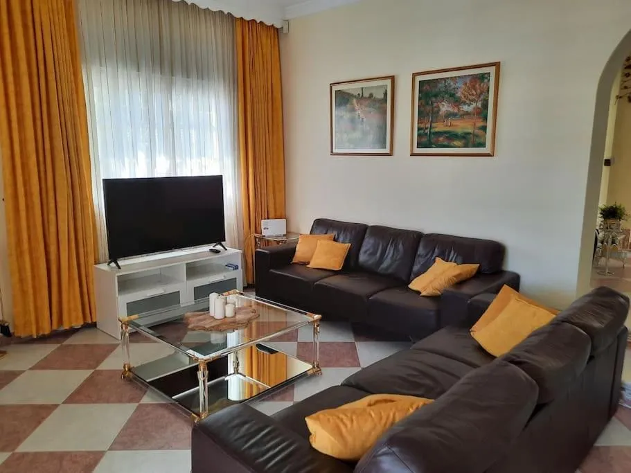 Communal lounge/ TV room in Villa Puerto de la Luz