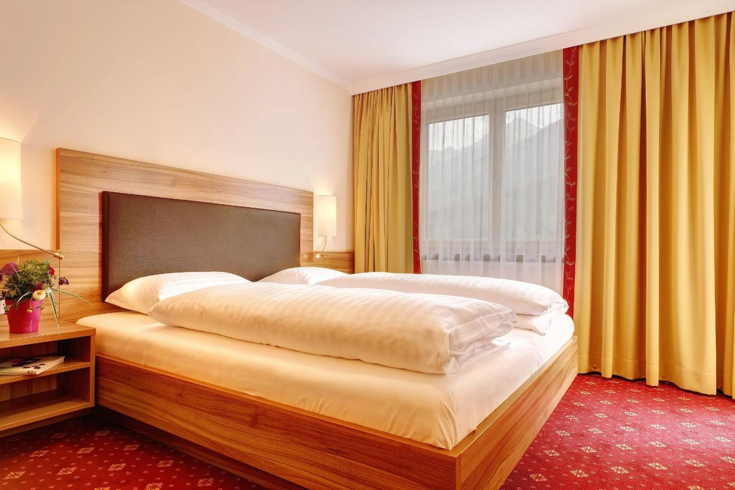 Bed in Hotel Finkenbergerhof