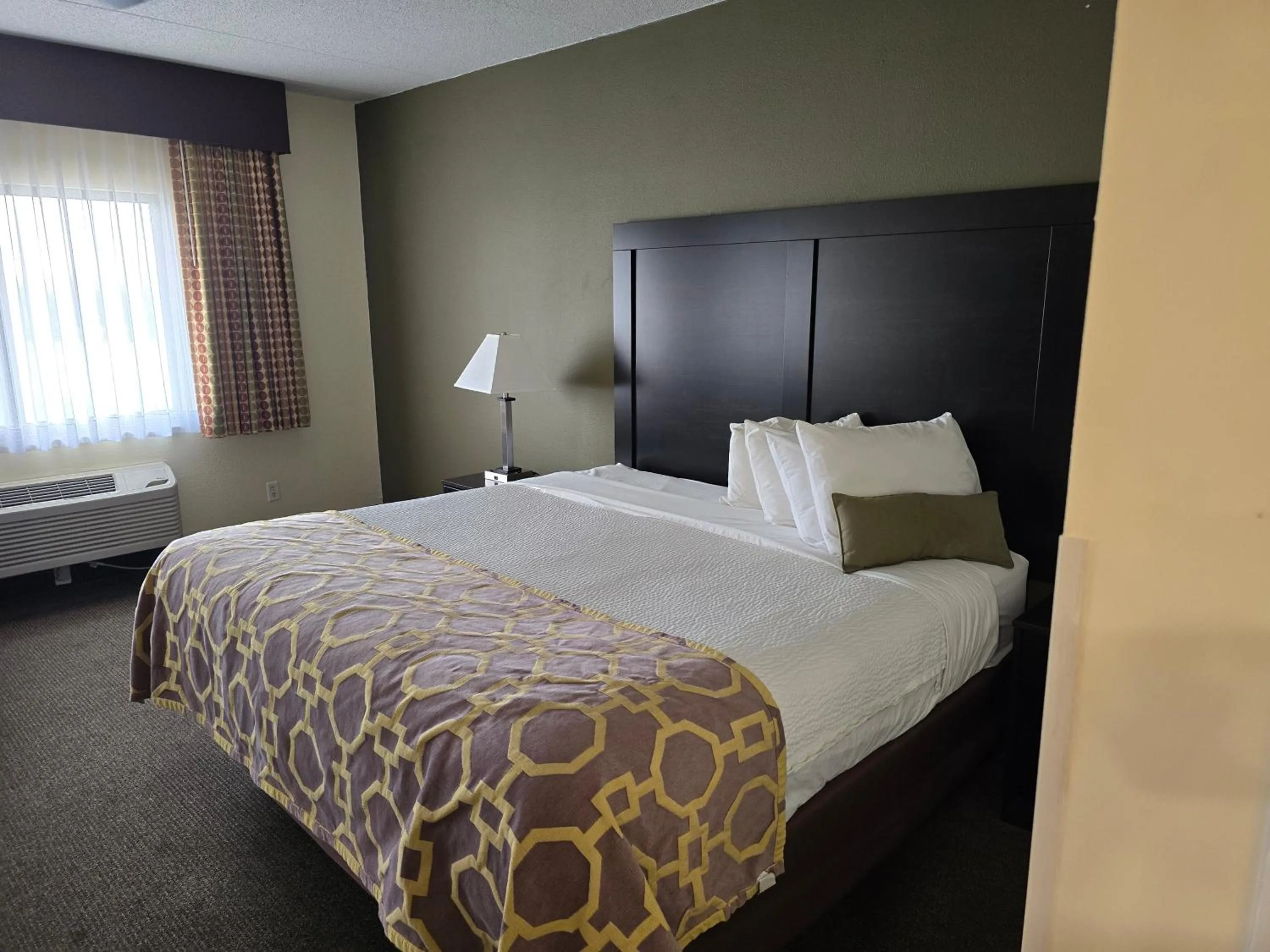 Bedroom, Bed in Baymont by Wyndham Janesville