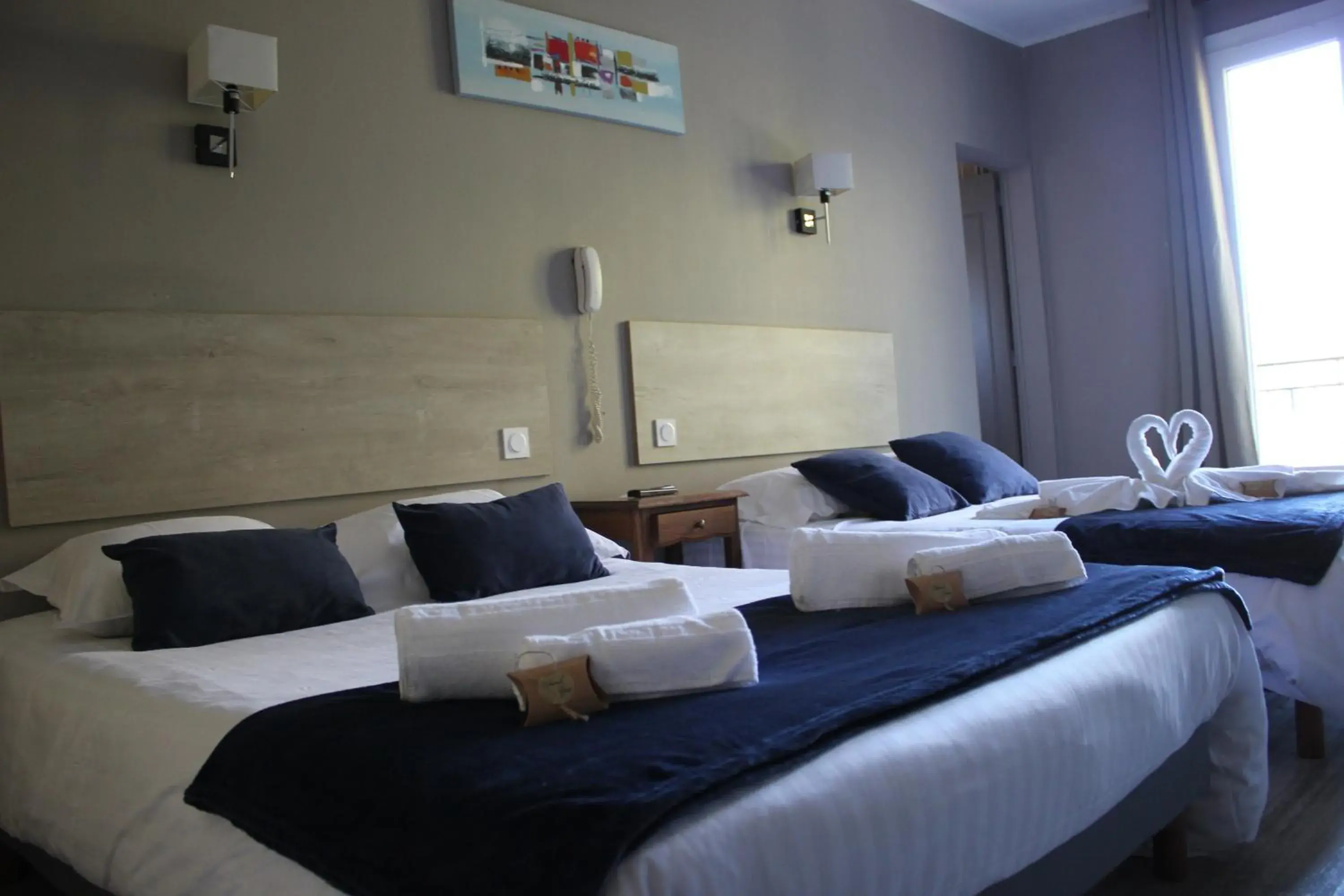 Quadruple Room in Hôtel de La Beauronne Quadruple Room in Hôtel de La Beauronne