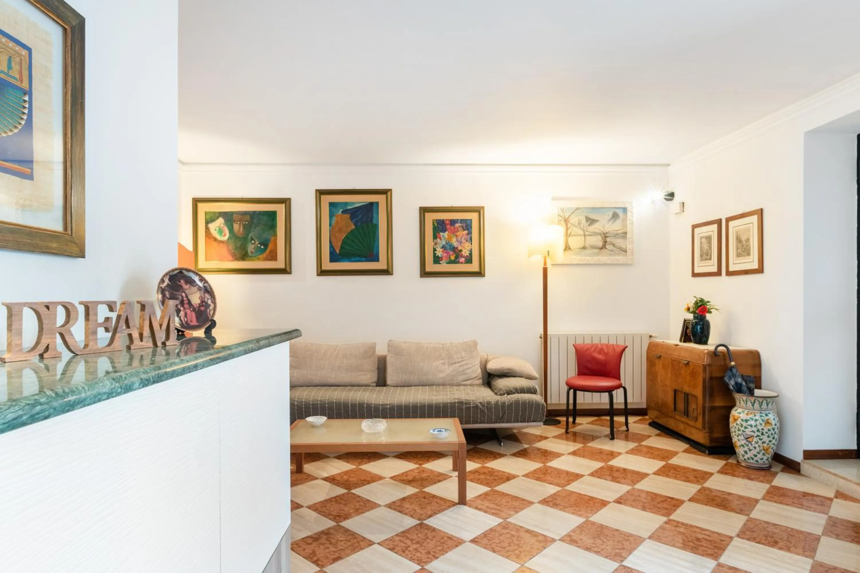 Living room in GuestHost - Via Etnea Cozy Apartment with Balcony