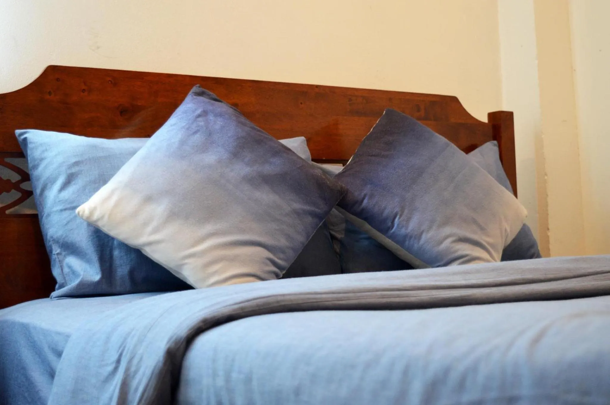 Bed in De Nawarat Chiangmai Boutique Apartment