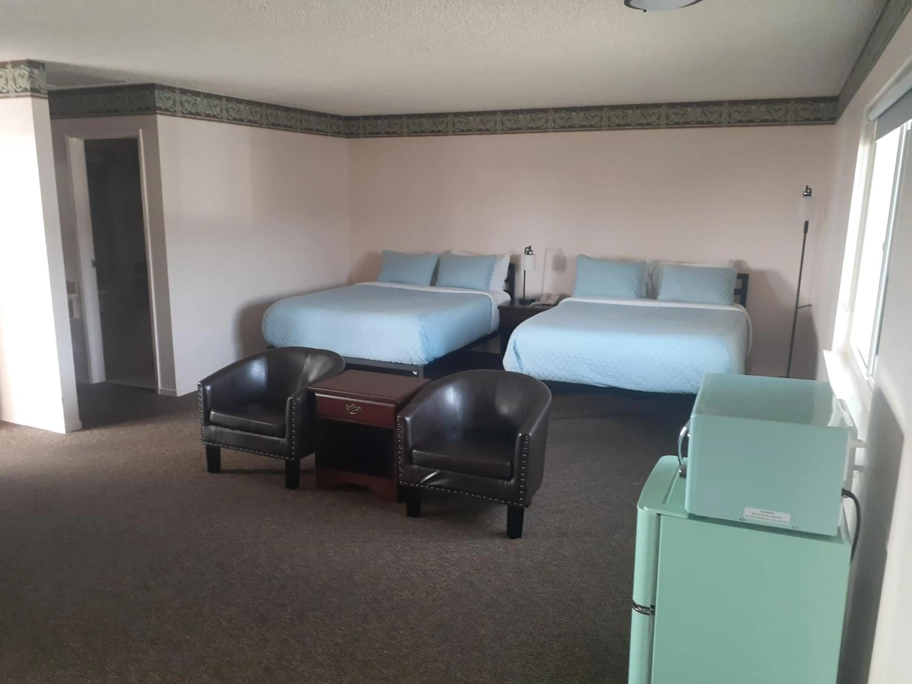 Bed in Coast Riders Inn