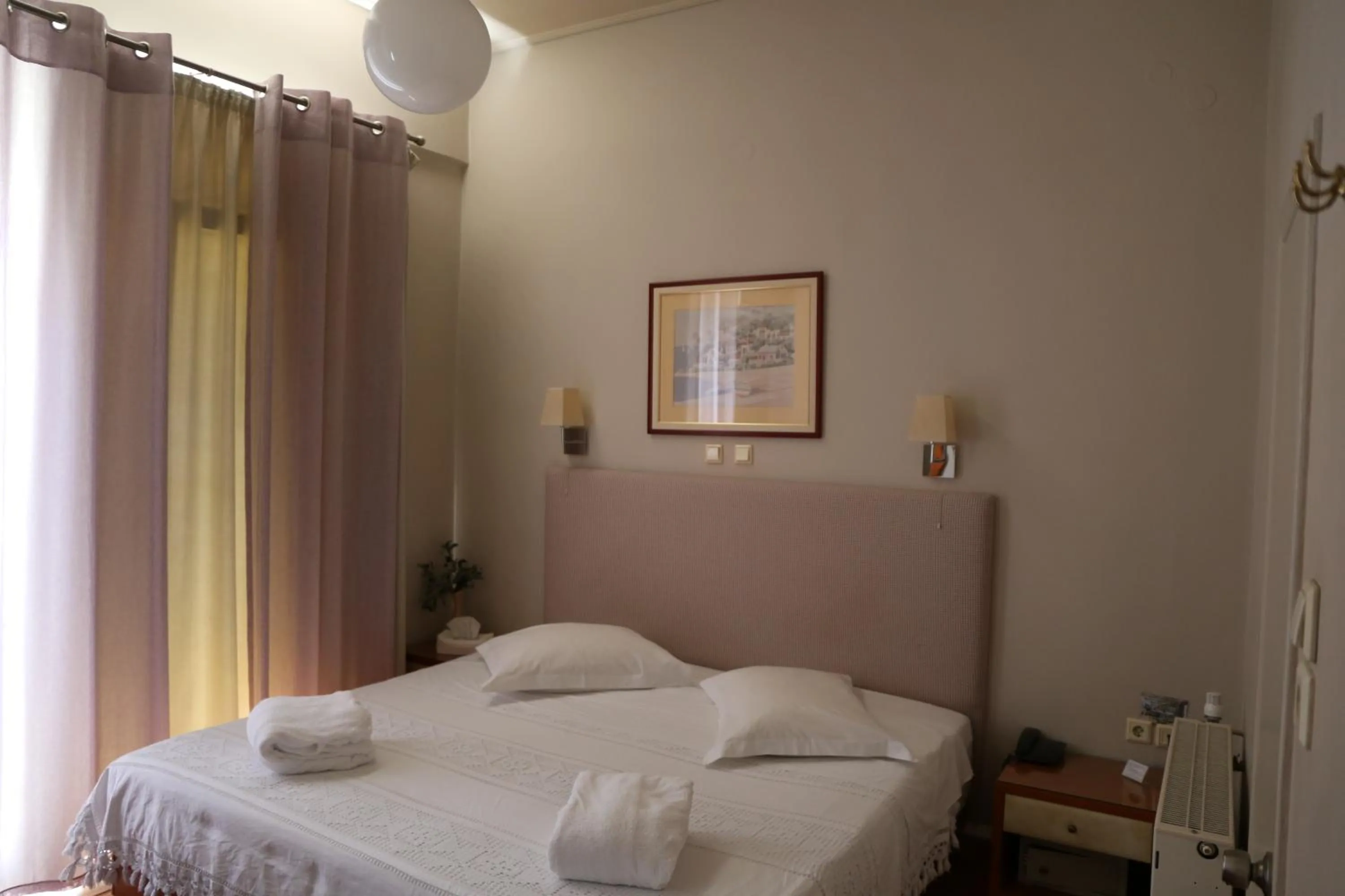 Bed in Esperia Boutique Hotel