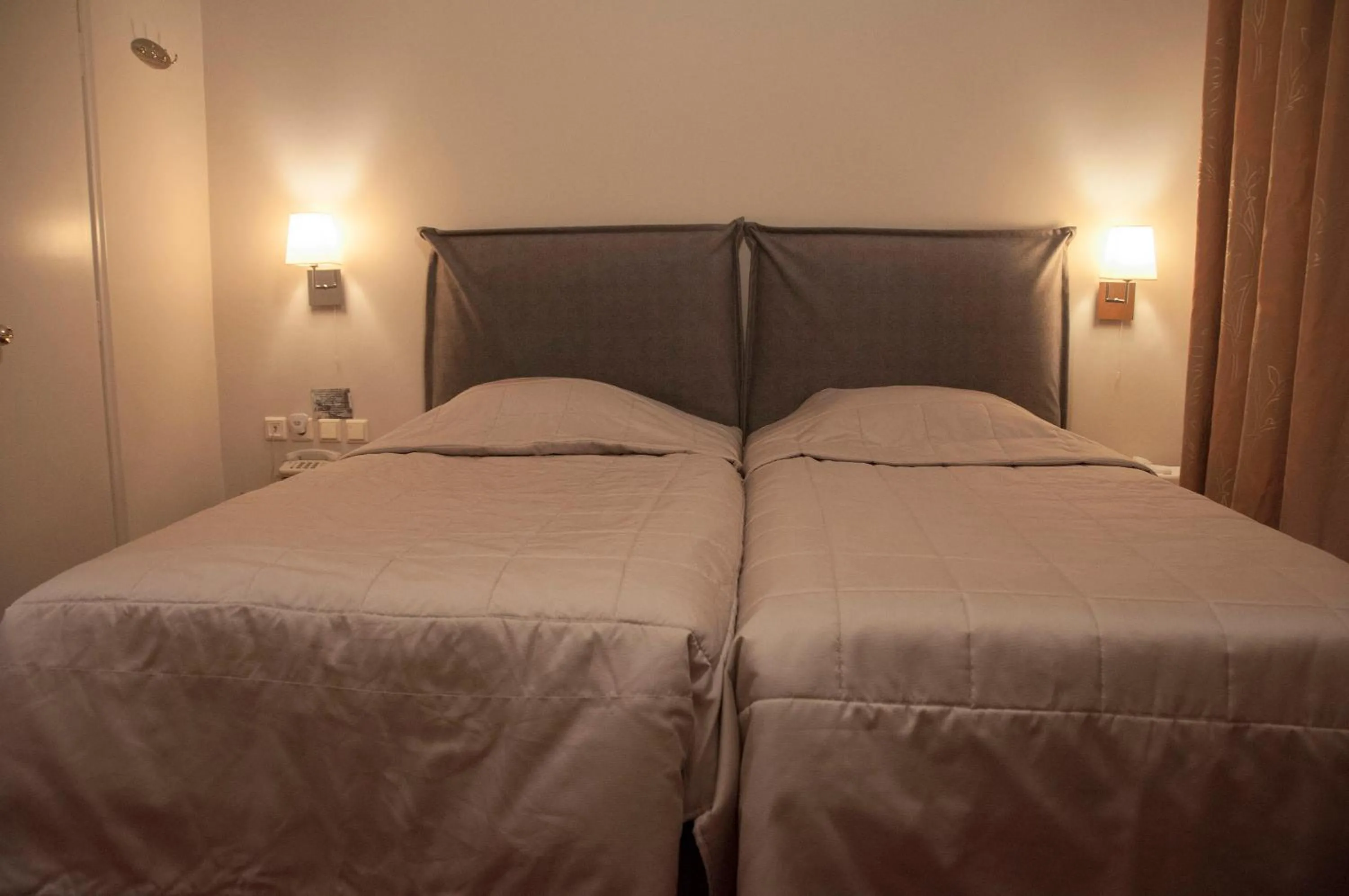 Bed in Esperia Boutique Hotel