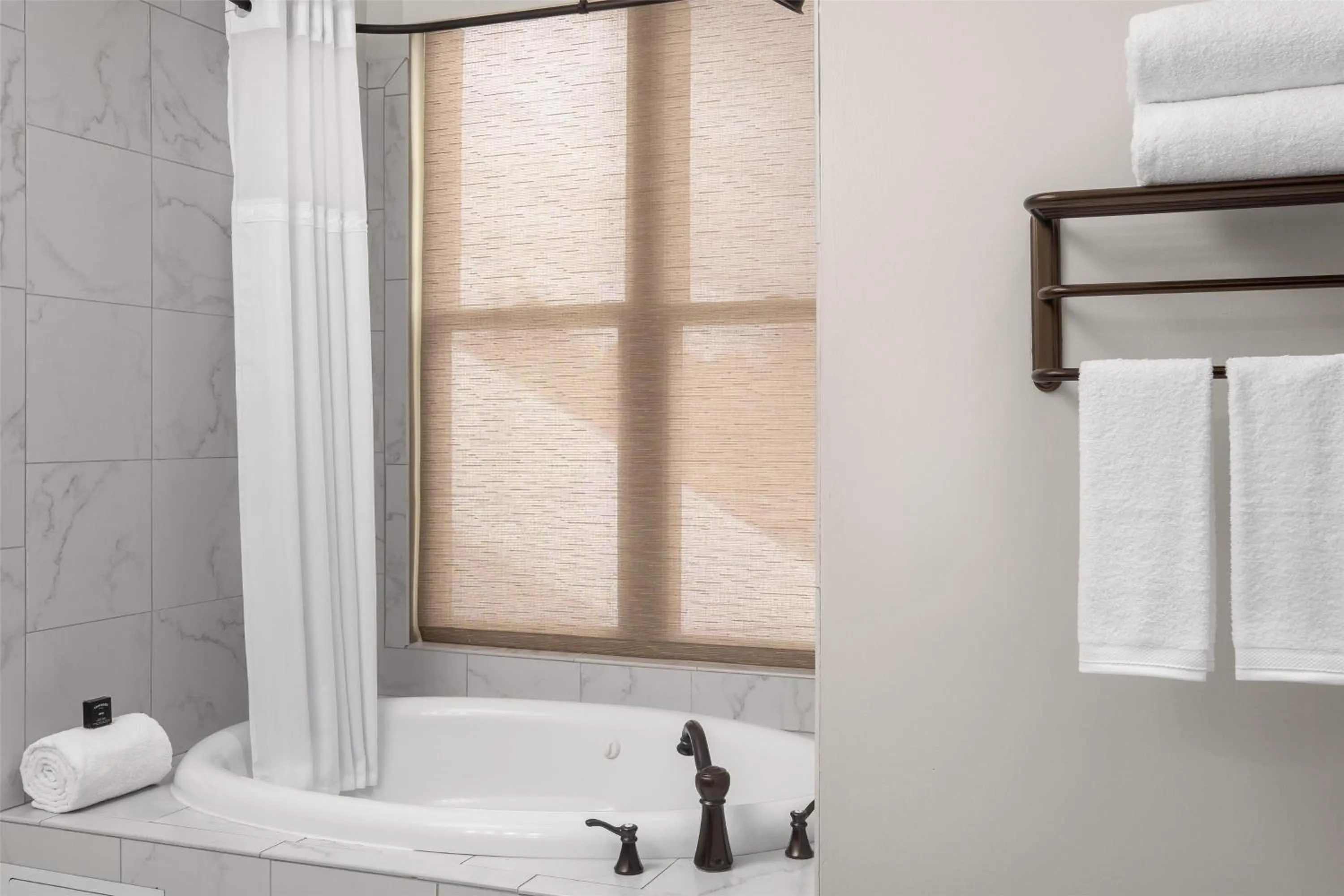 Bathroom in National Hotel Jackson, Tapestry Collection by Hilton