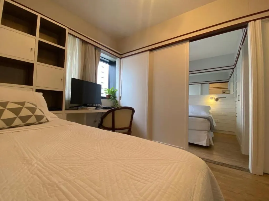 Living room, Bed in JP Crauford Hospedagem