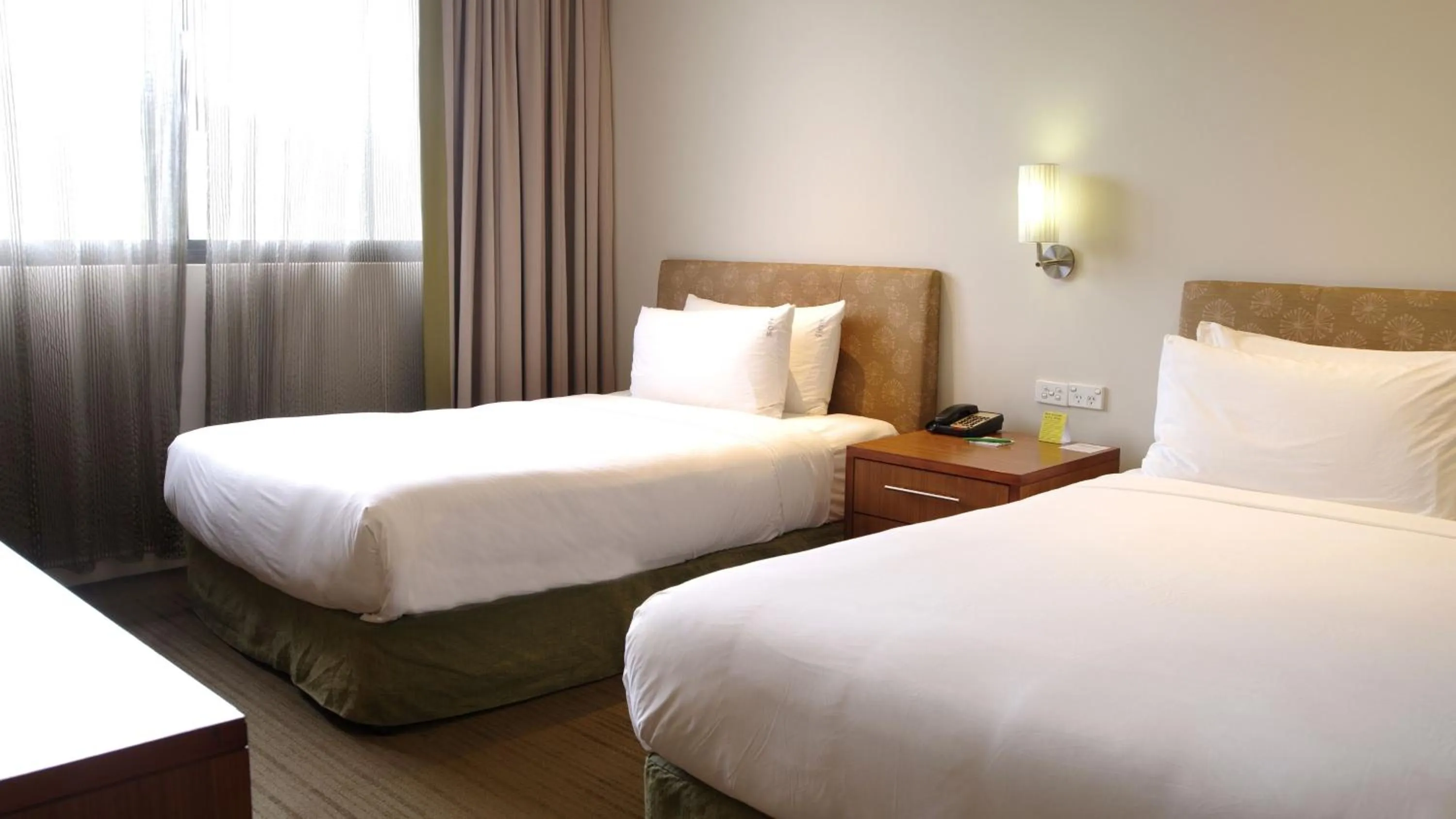 Photo of the whole room, Bed in Holiday Inn & Suites Port Moresby by IHG