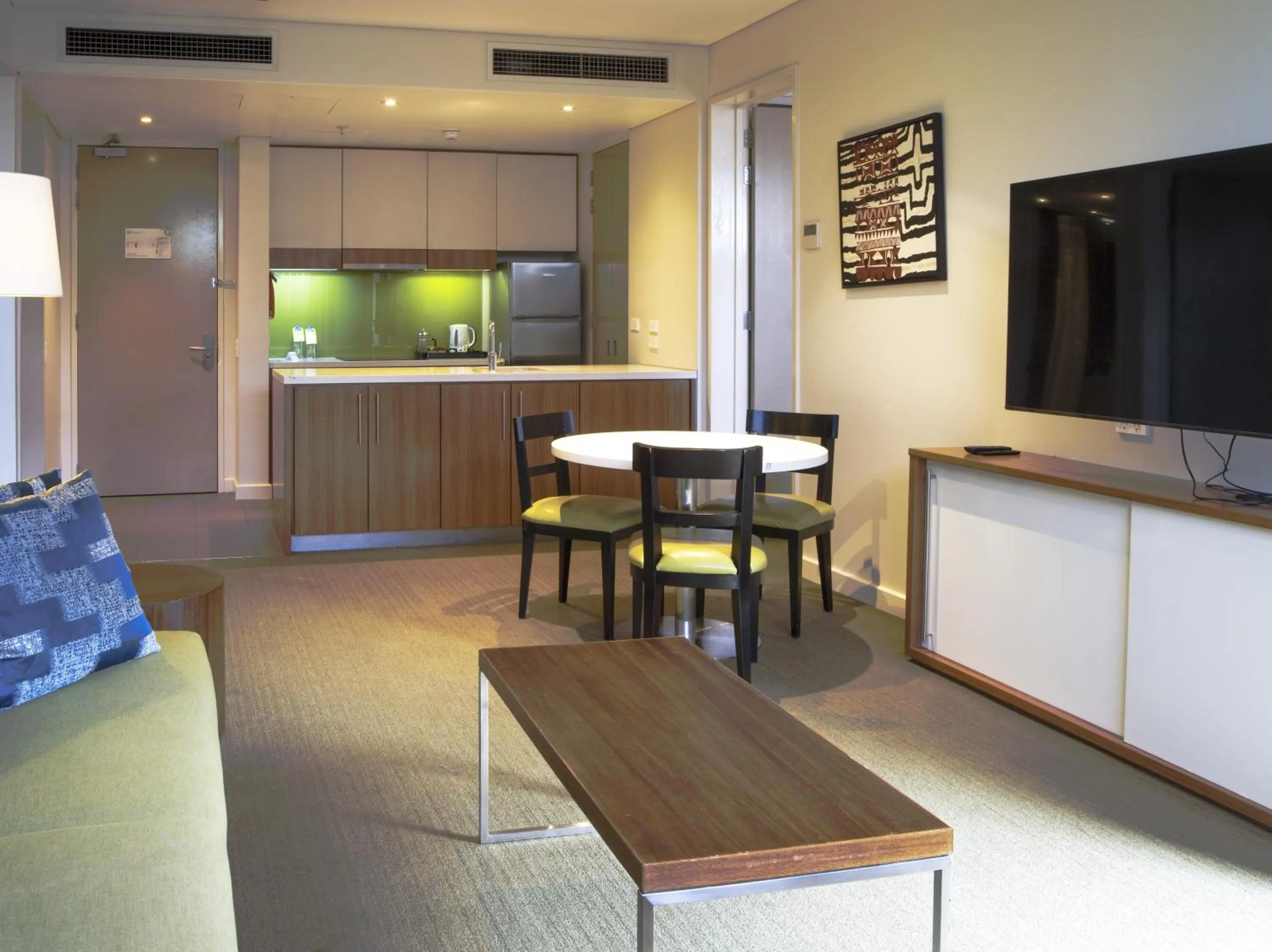 Communal lounge/ TV room in Holiday Inn & Suites Port Moresby by IHG