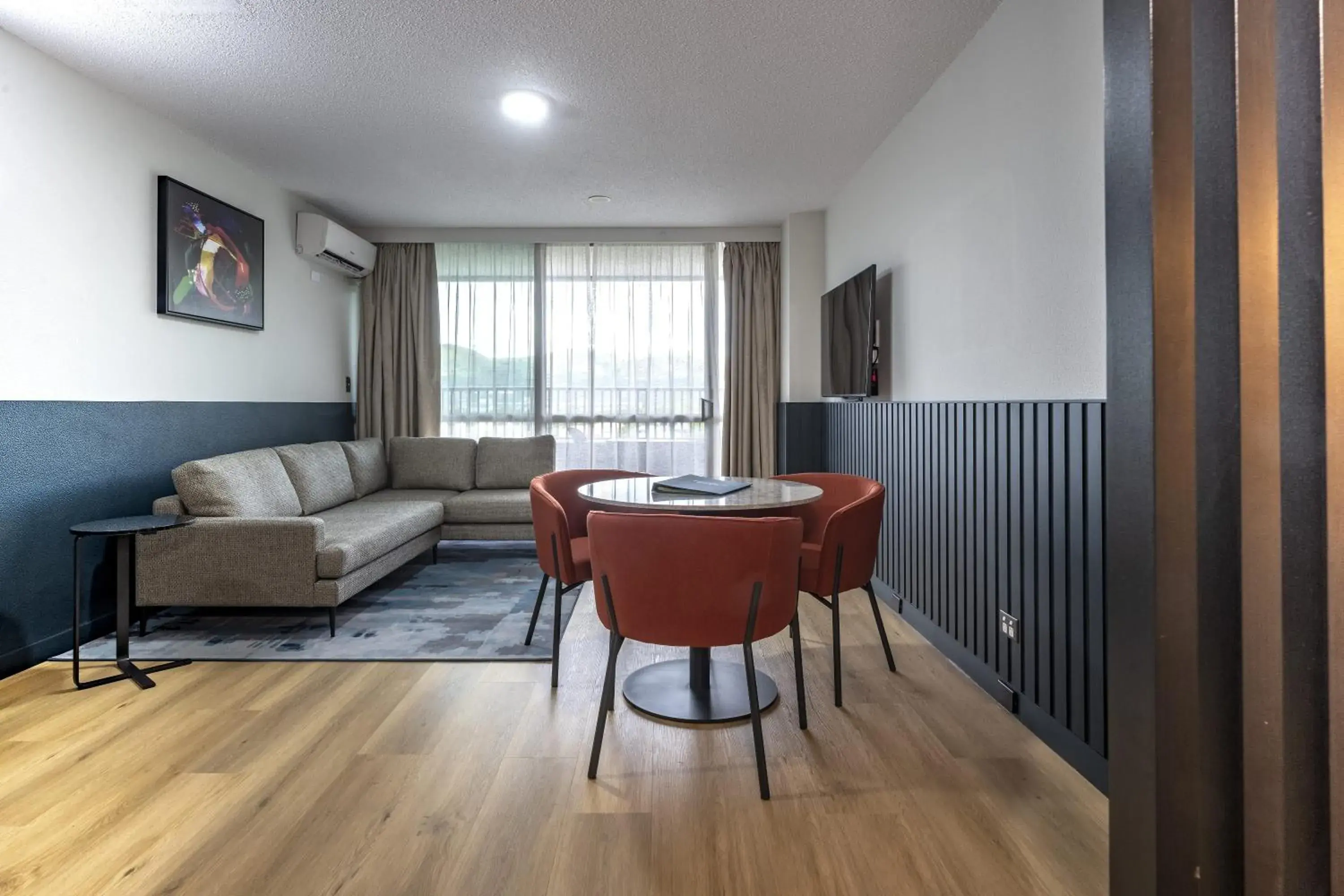 Living room in Holiday Inn & Suites Port Moresby by IHG Living room in Holiday Inn & Suites Port Moresby by IHG