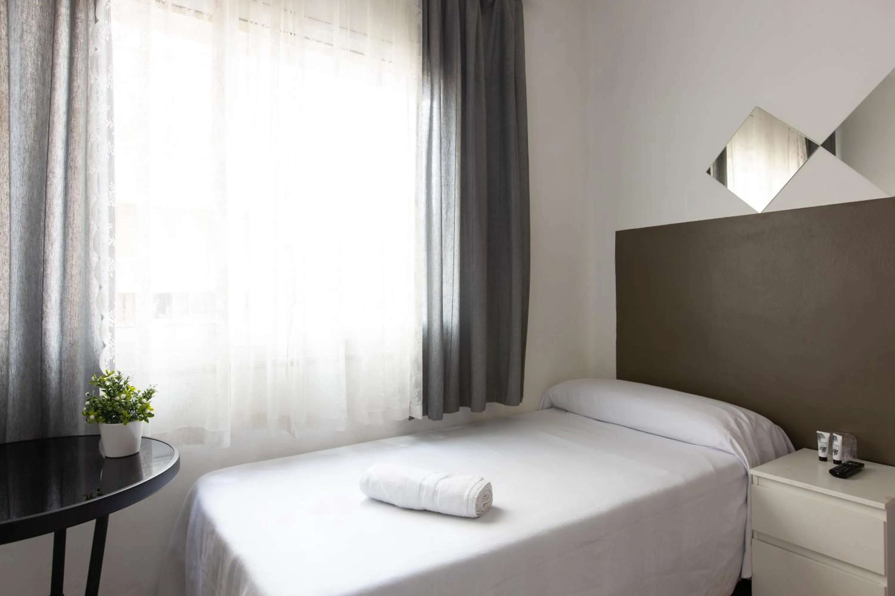 Bed in Pensión Galicia