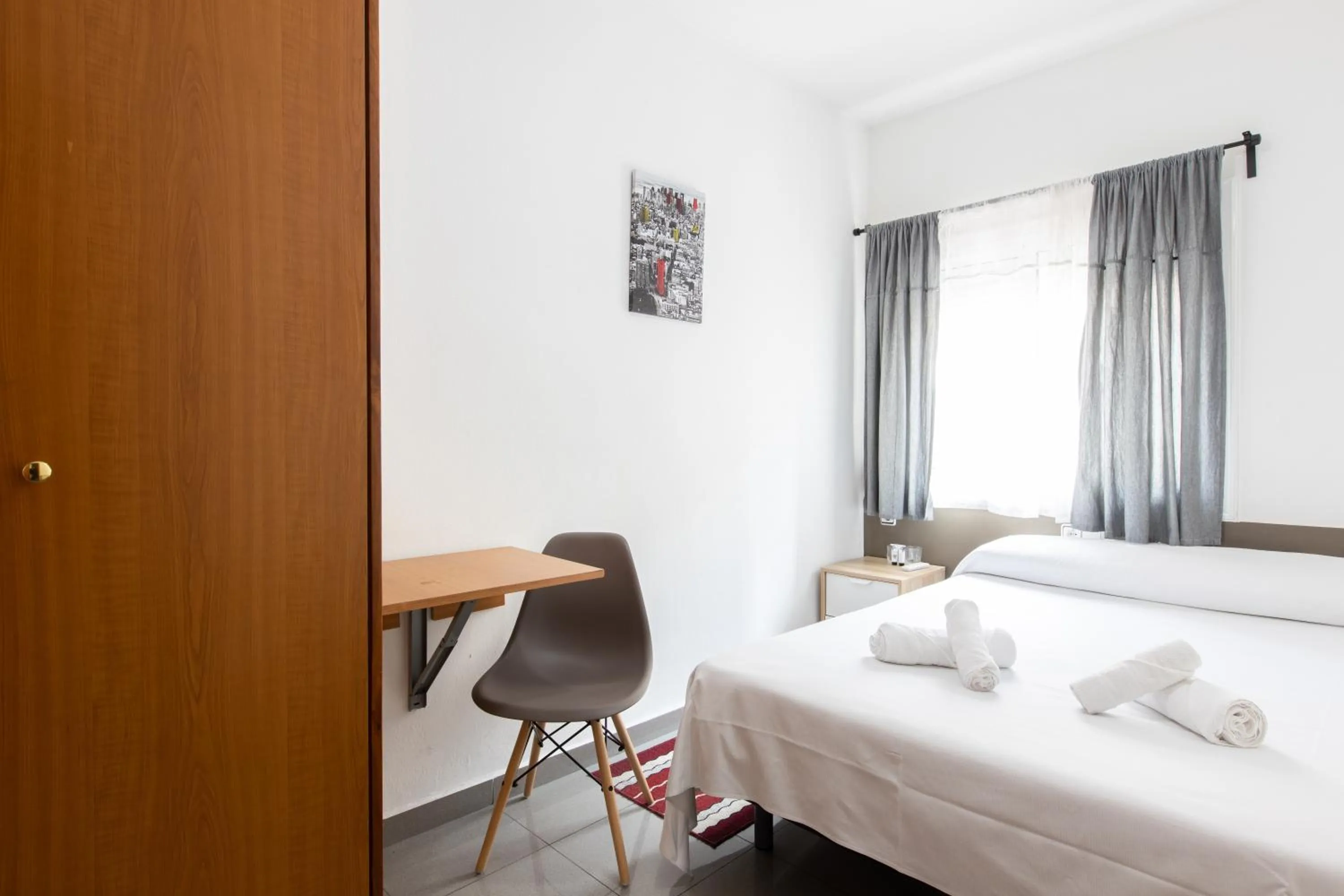 Bed in Pensión Galicia