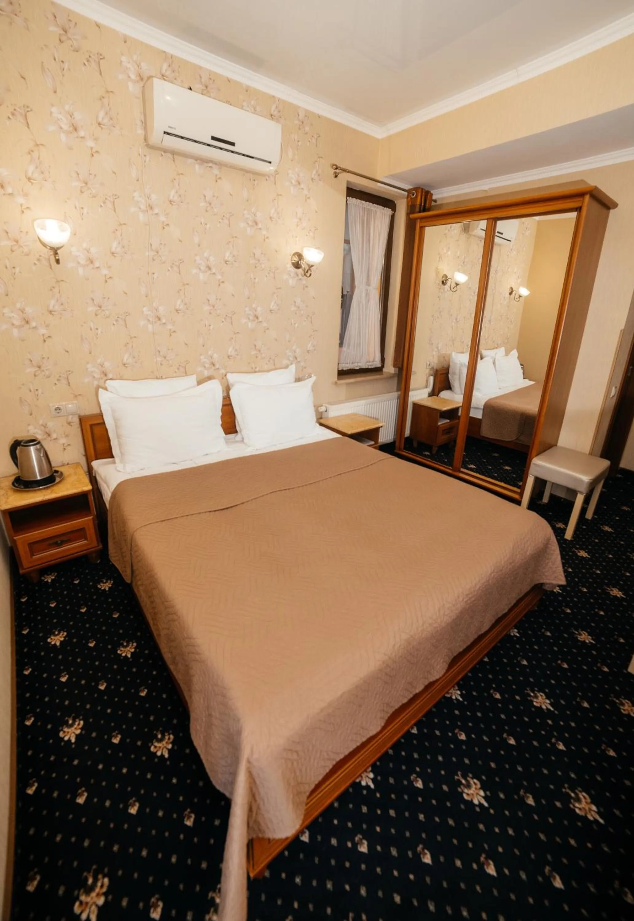 Bed in Hotel Afrodita