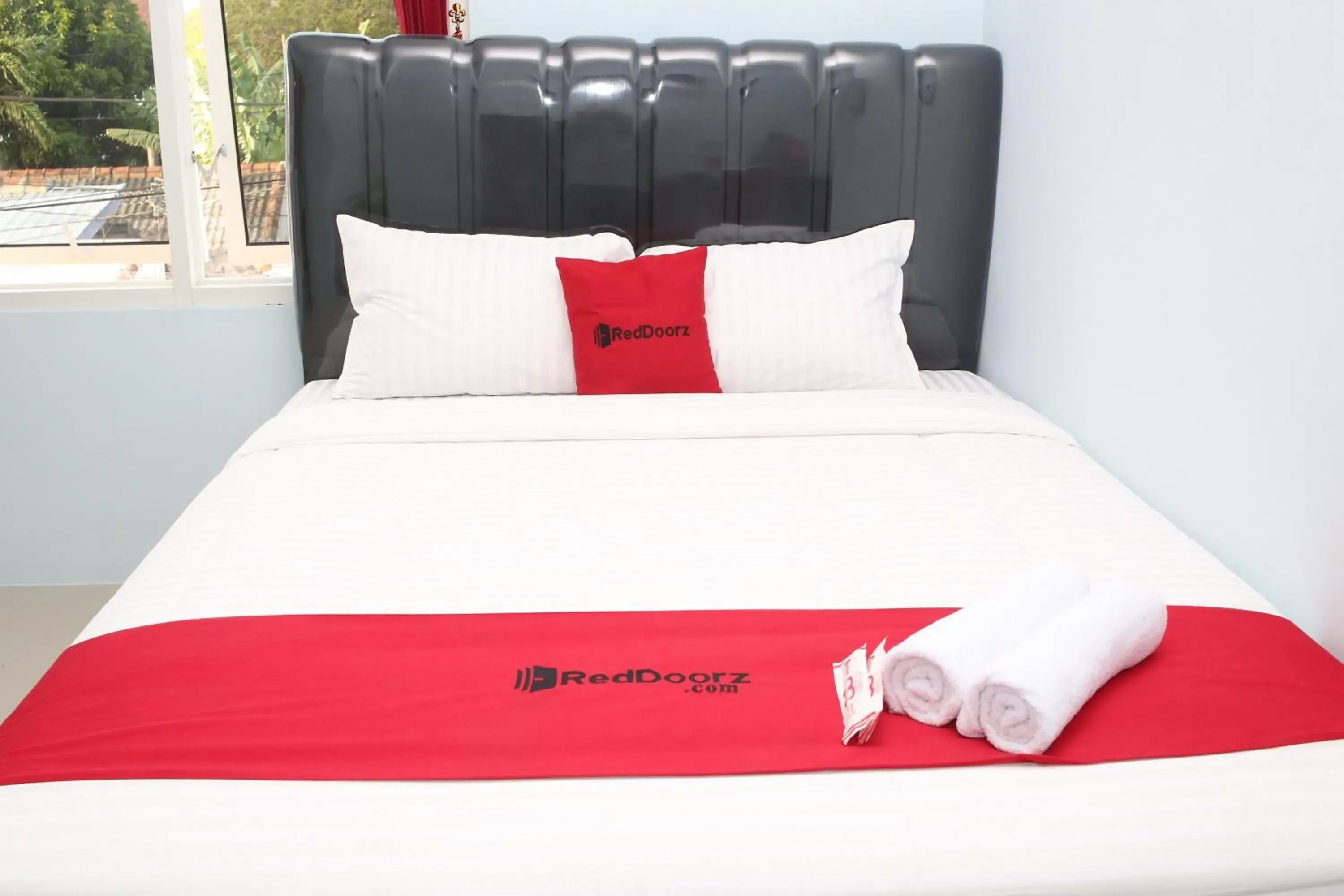 Bed in RedDoorz Syariah near Suncity Mall Madiun Bed in RedDoorz Syariah near Suncity Mall Madiun