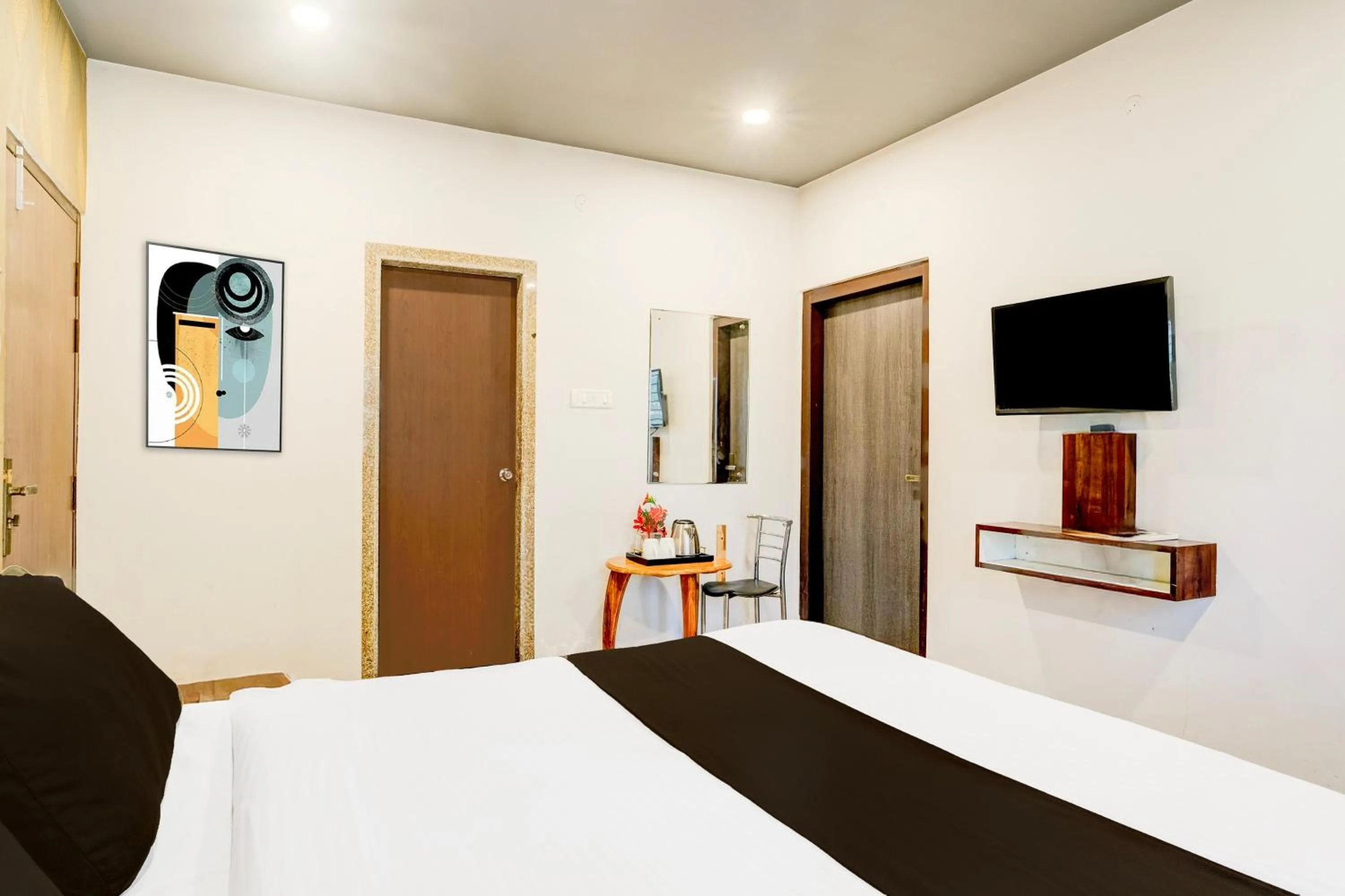 Bedroom, Bed in Super Townhouse Beltola Tiniali Formerly Hotel Pratishtha