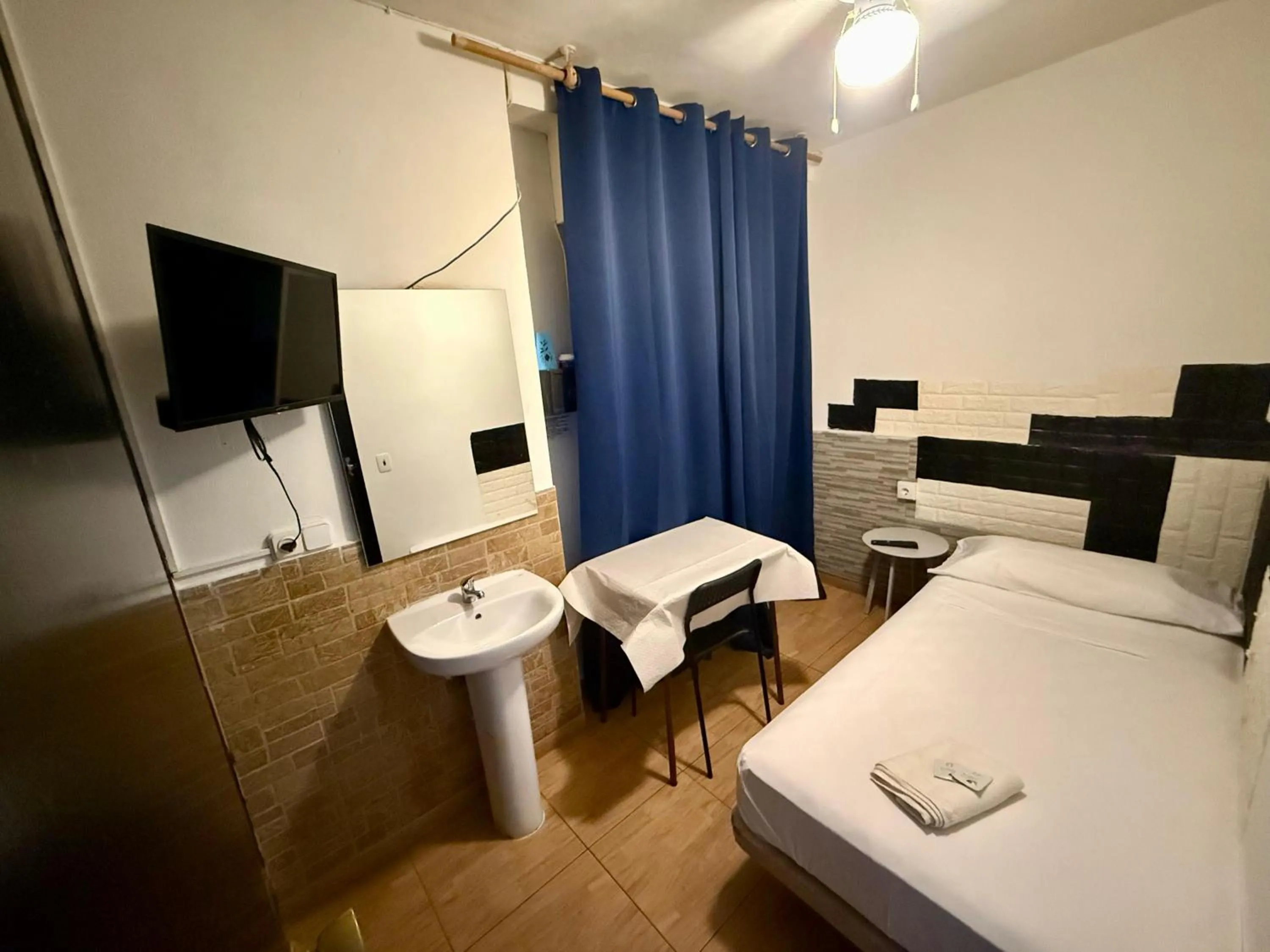 Bed in PENSIÓN ROSA