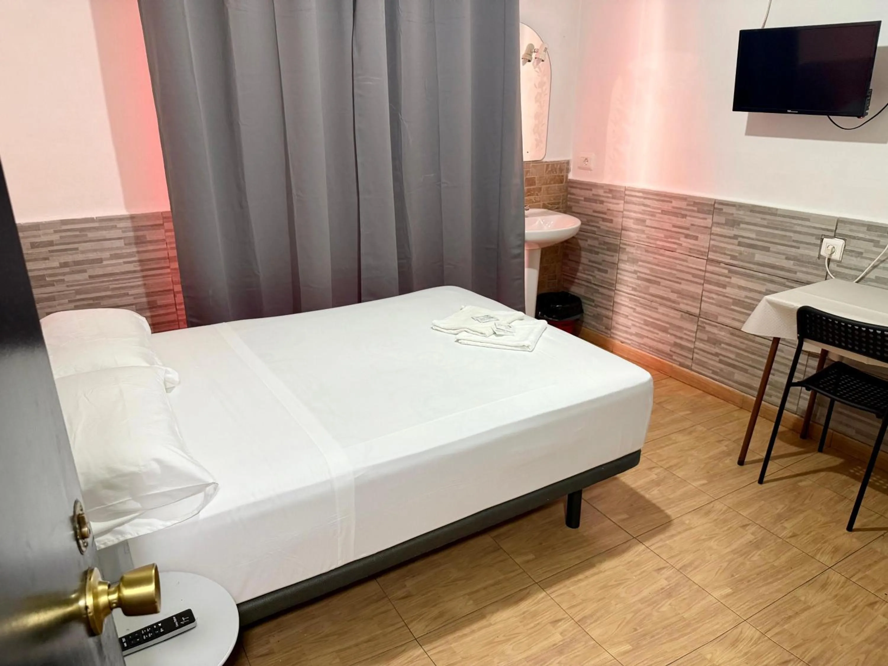 Bed in PENSIÓN ROSA