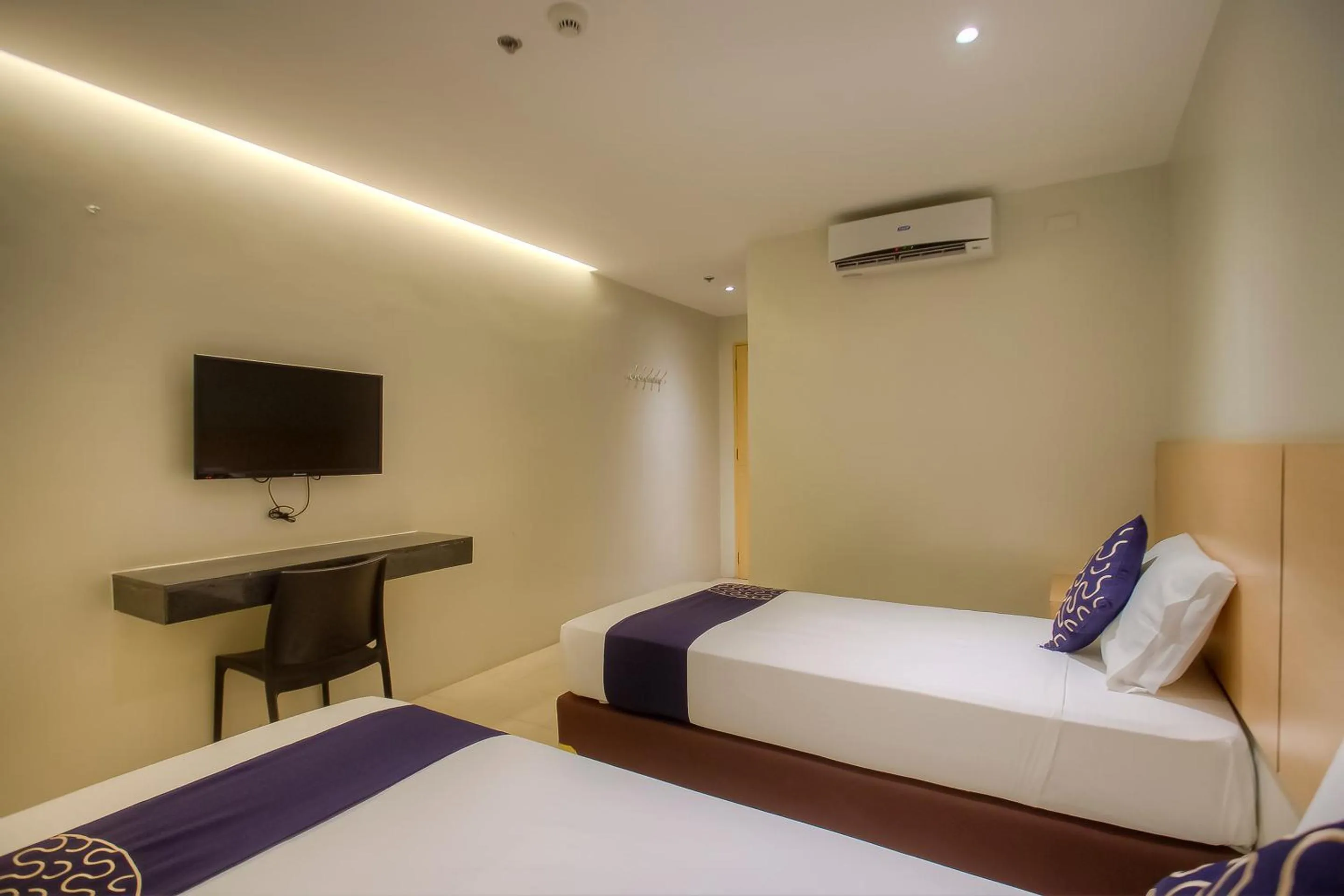 Bedroom, Bed in Capital O 827 Speciale Hotel