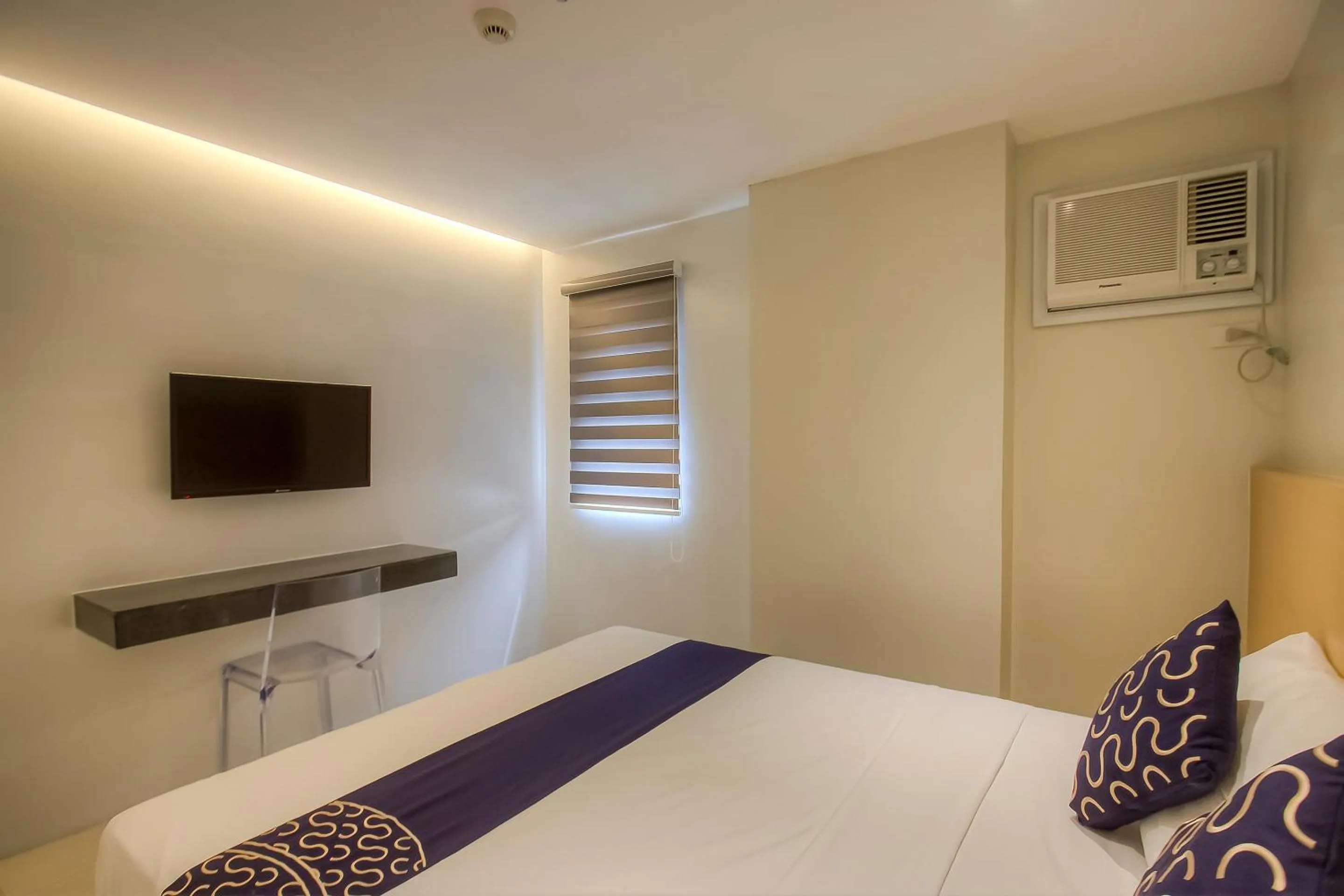 Bedroom, Bed in Capital O 827 Speciale Hotel