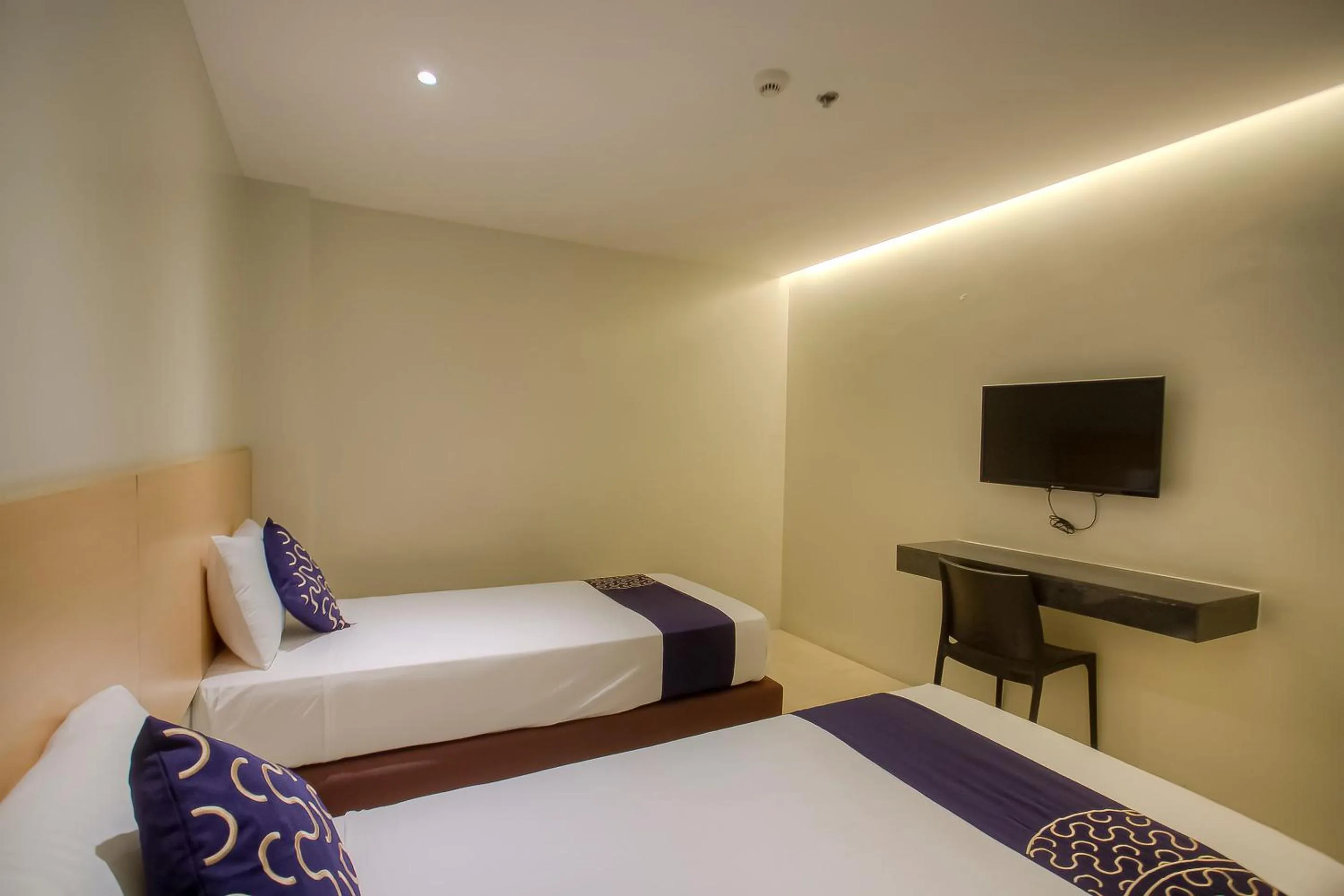 Bedroom, Bed in Capital O 827 Speciale Hotel