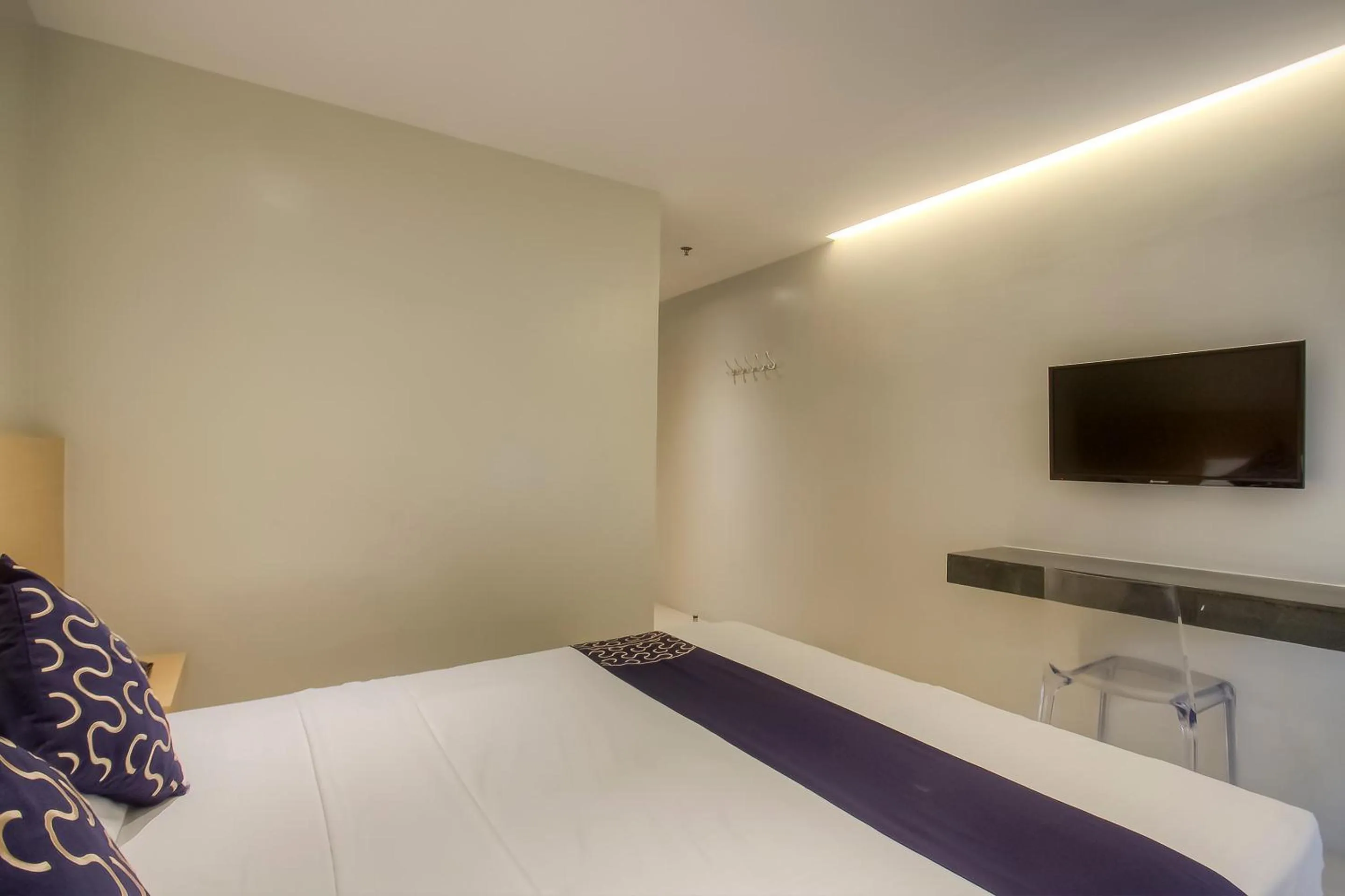 Bedroom, Bed in Capital O 827 Speciale Hotel