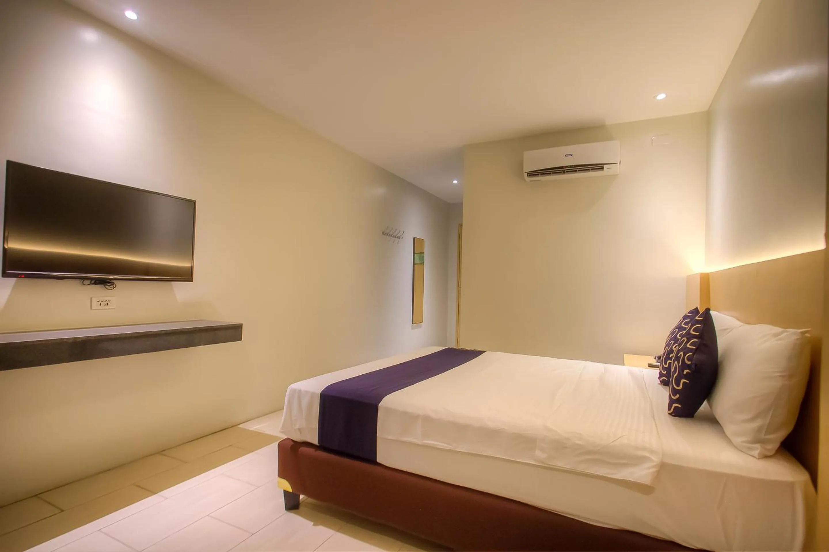 Bedroom, Bed in Capital O 827 Speciale Hotel