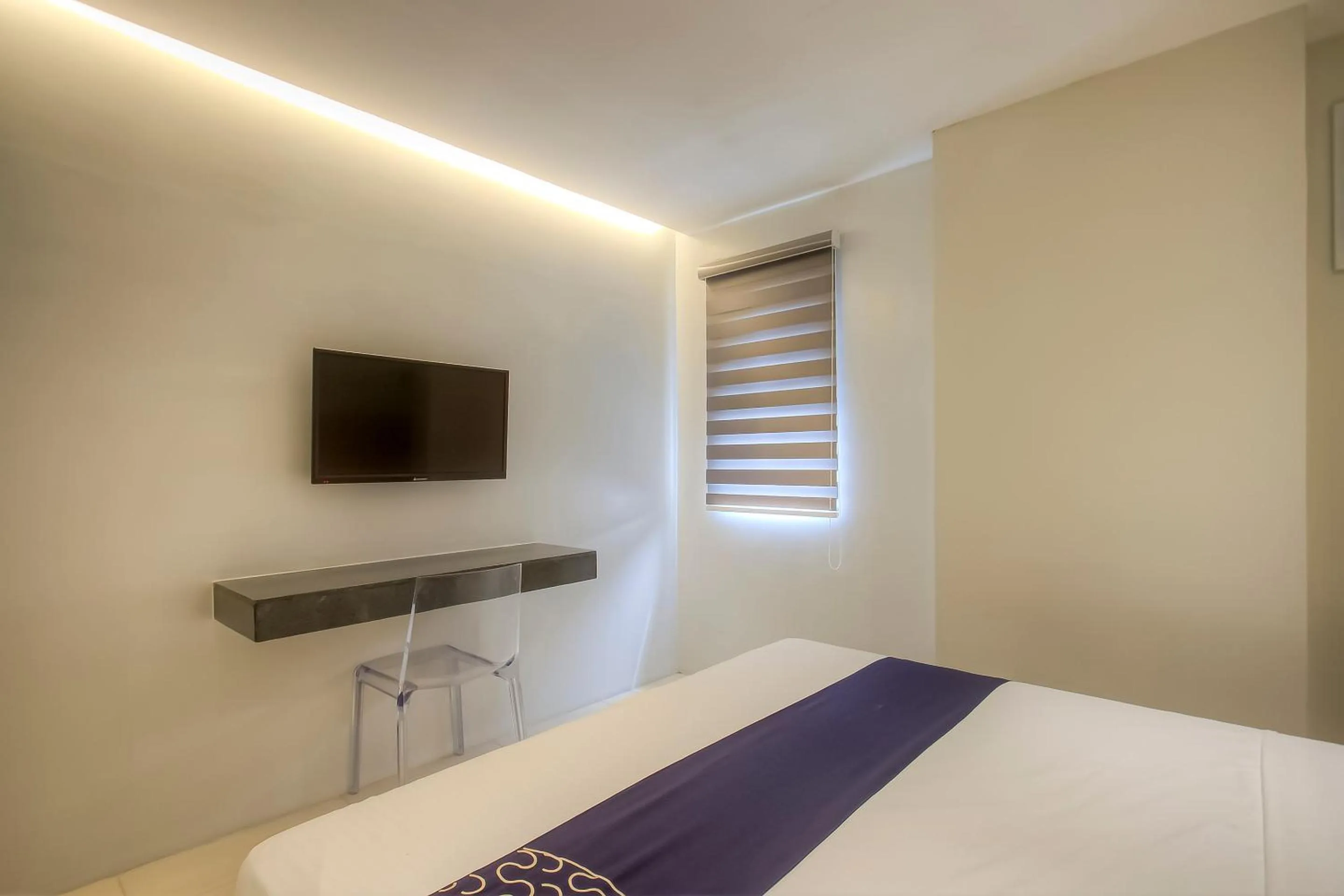 Bedroom, Bed in Capital O 827 Speciale Hotel