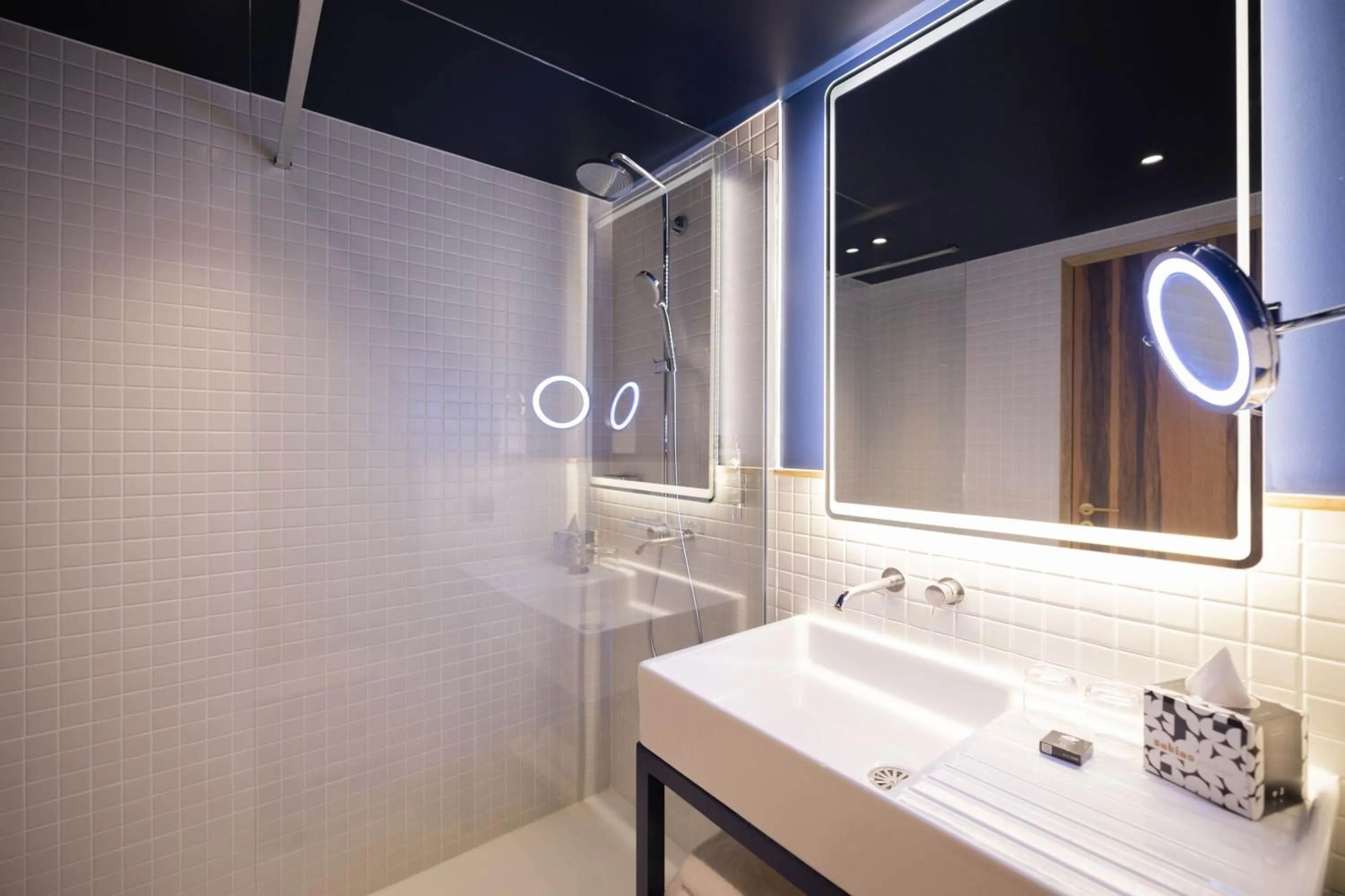 Bathroom in KOPSTER Hotel Residence Paris Ouest Colombes