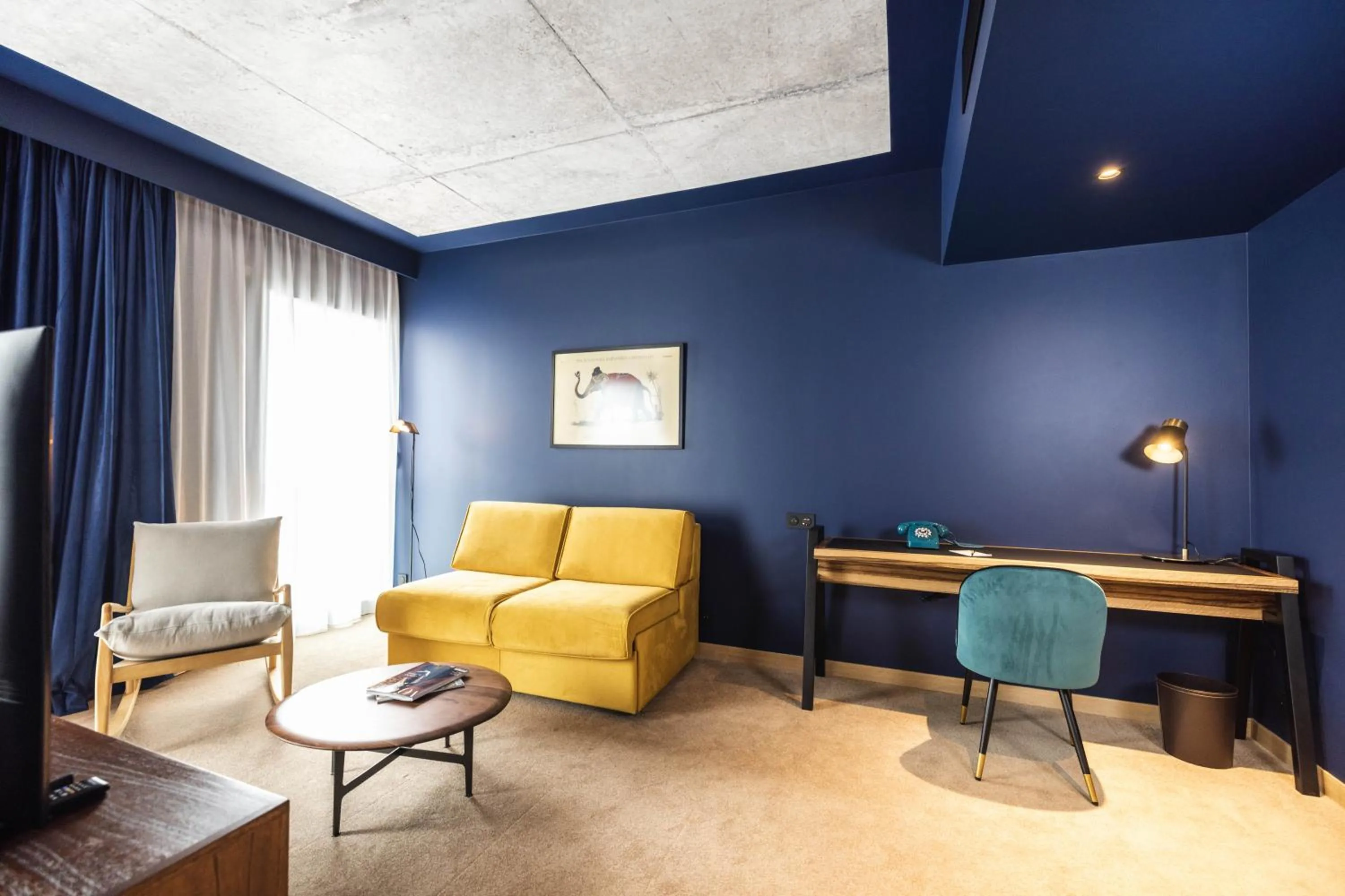 Living room in KOPSTER Hotel Residence Paris Ouest Colombes