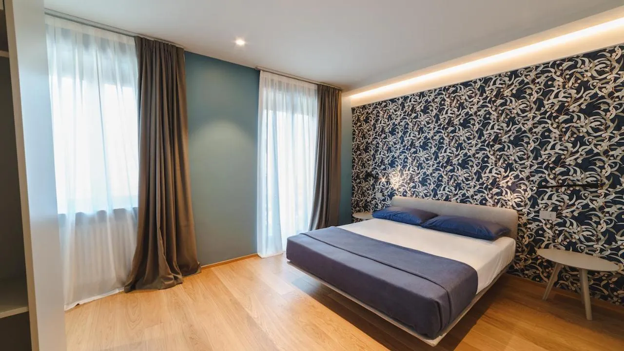 Bed in Vietti Apartments