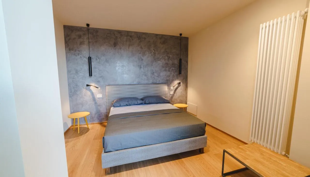 Bed in Vietti Apartments