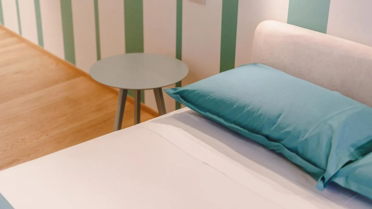 Bed in Vietti Apartments