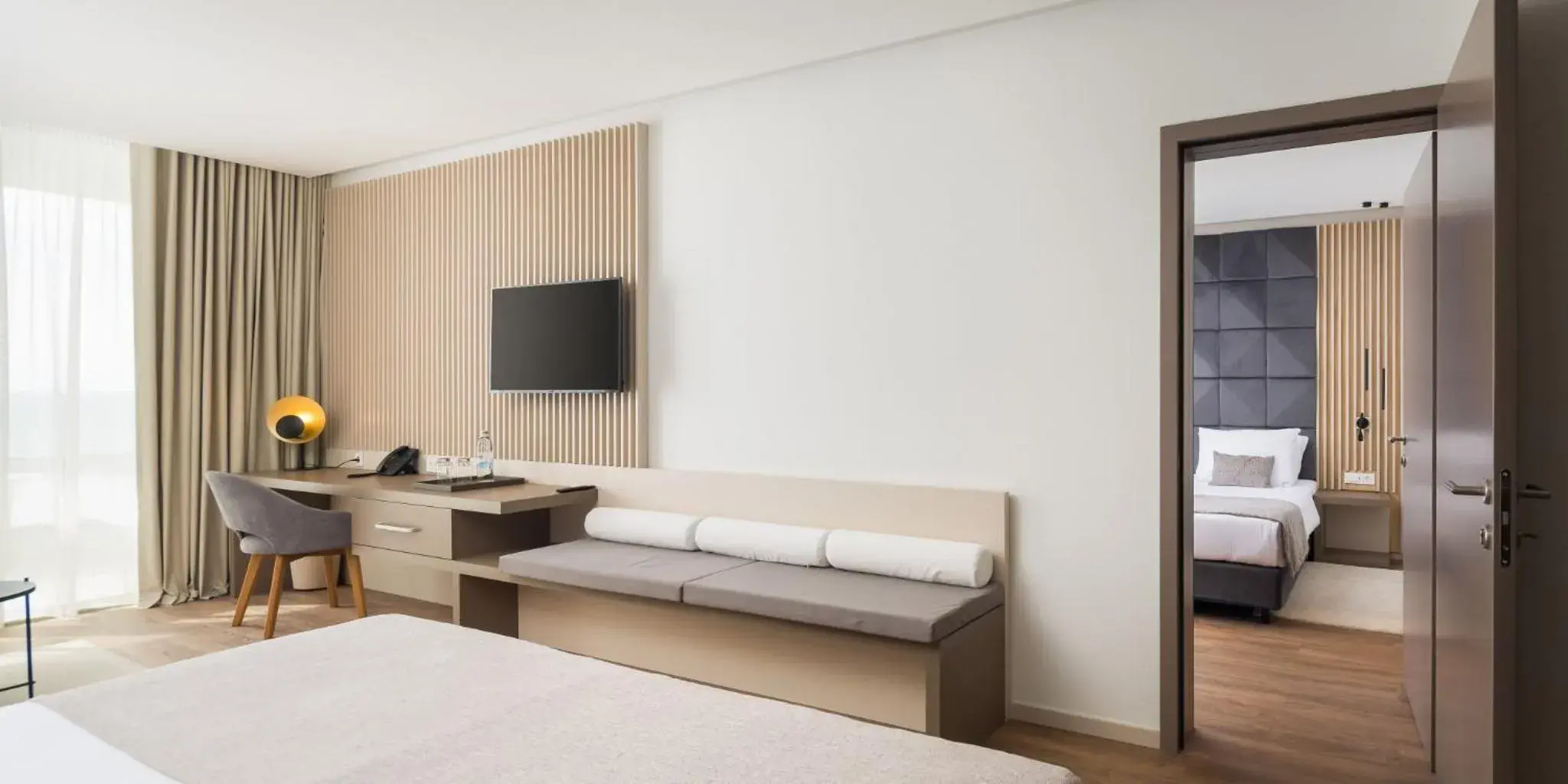 TV and multimedia, Bed in Aminess Laurel Khalani Hotel TV and multimedia, Bed in Aminess Laurel Khalani Hotel