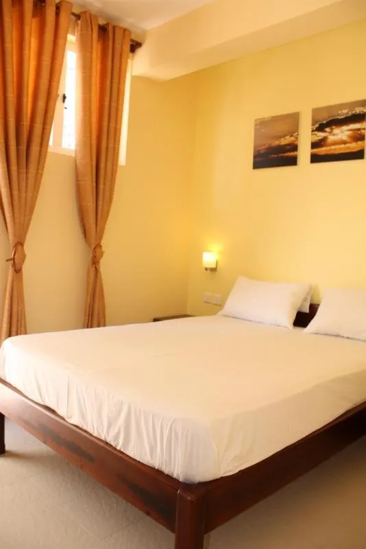 Bed in Le cactus guesthouse