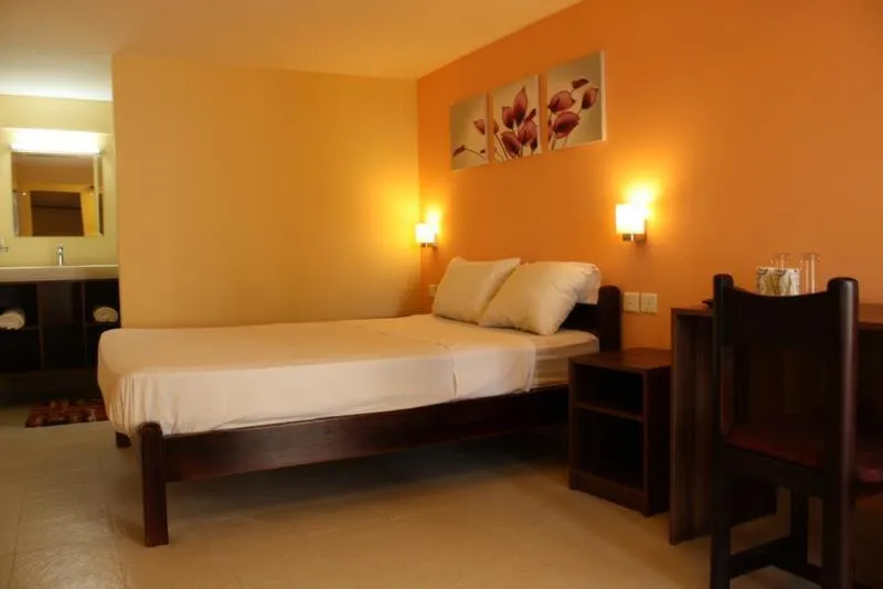 Bed in Le cactus guesthouse