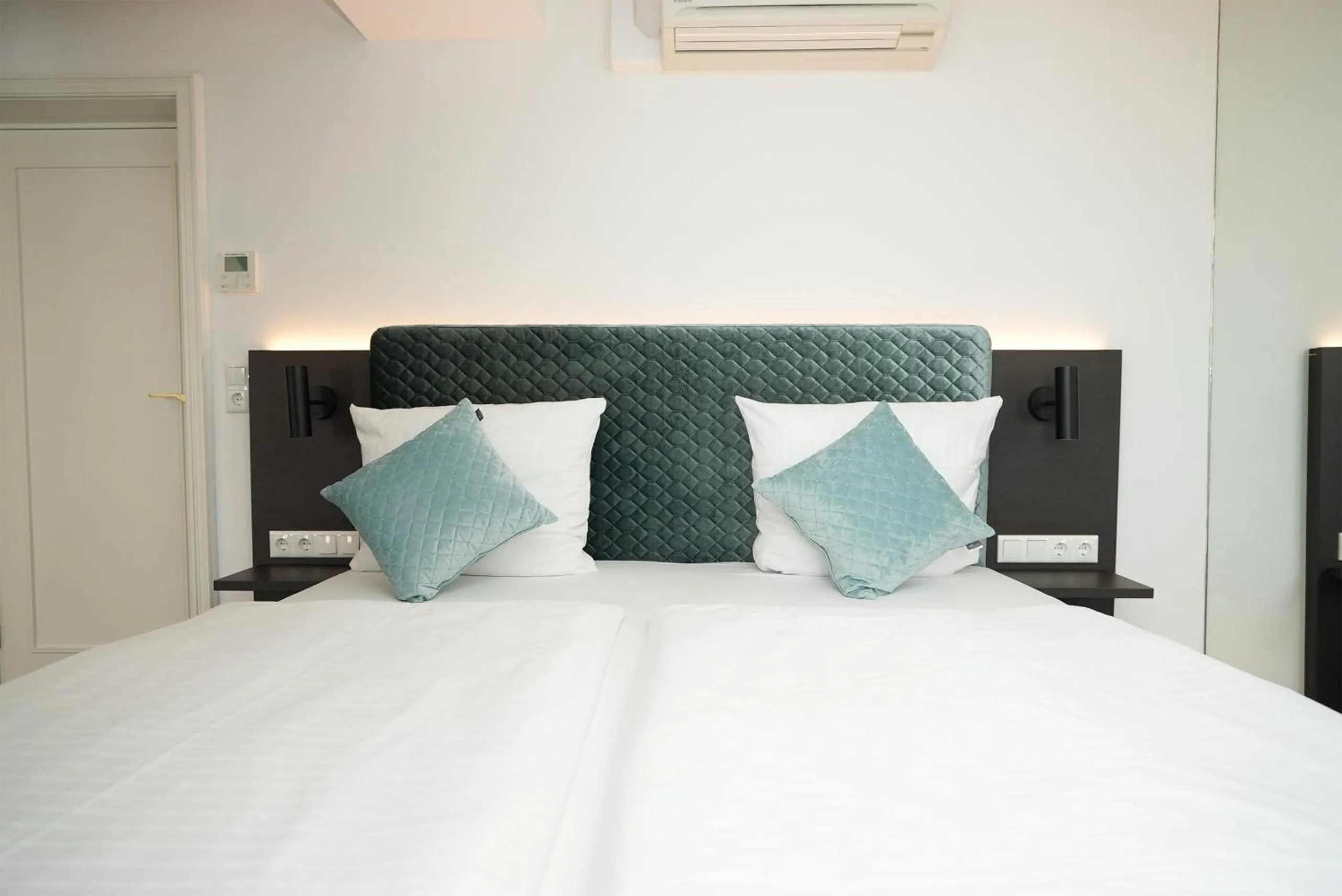 Bed in Hotel Palmenhof