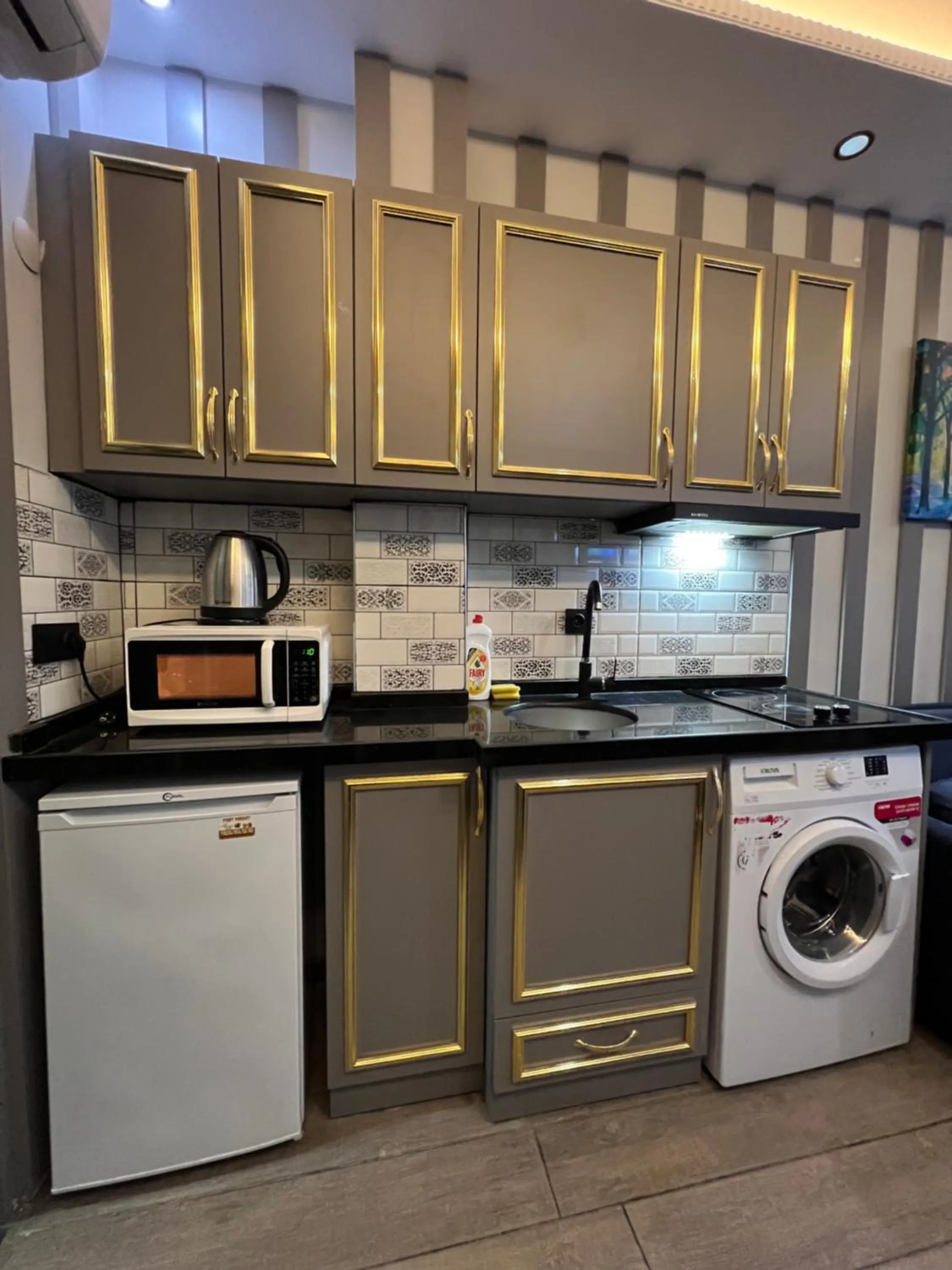 Kitchen or kitchenette in Taksim Larissa hotel suites