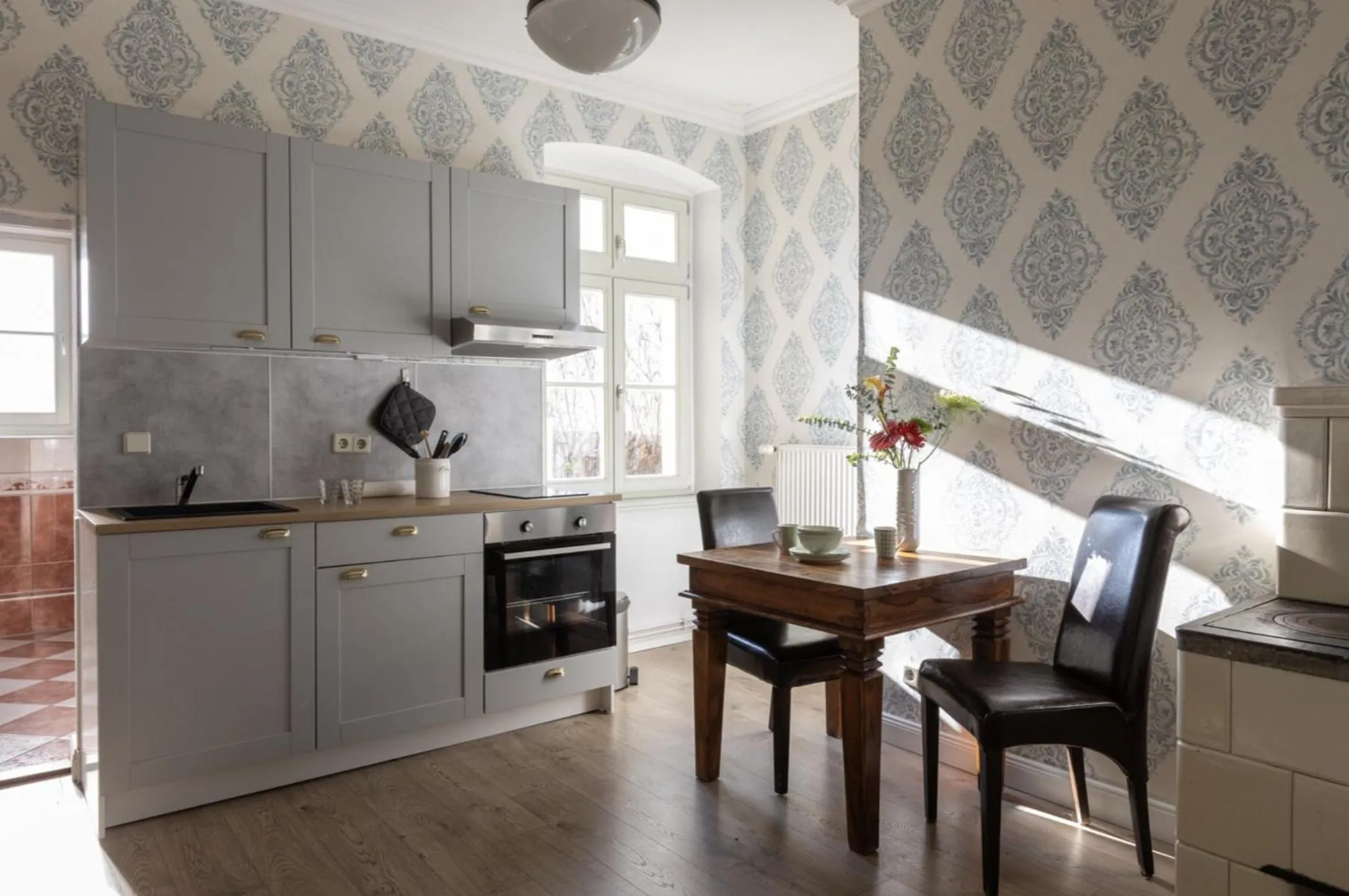 Kitchen or kitchenette in THE GATE GARDEN Hotel