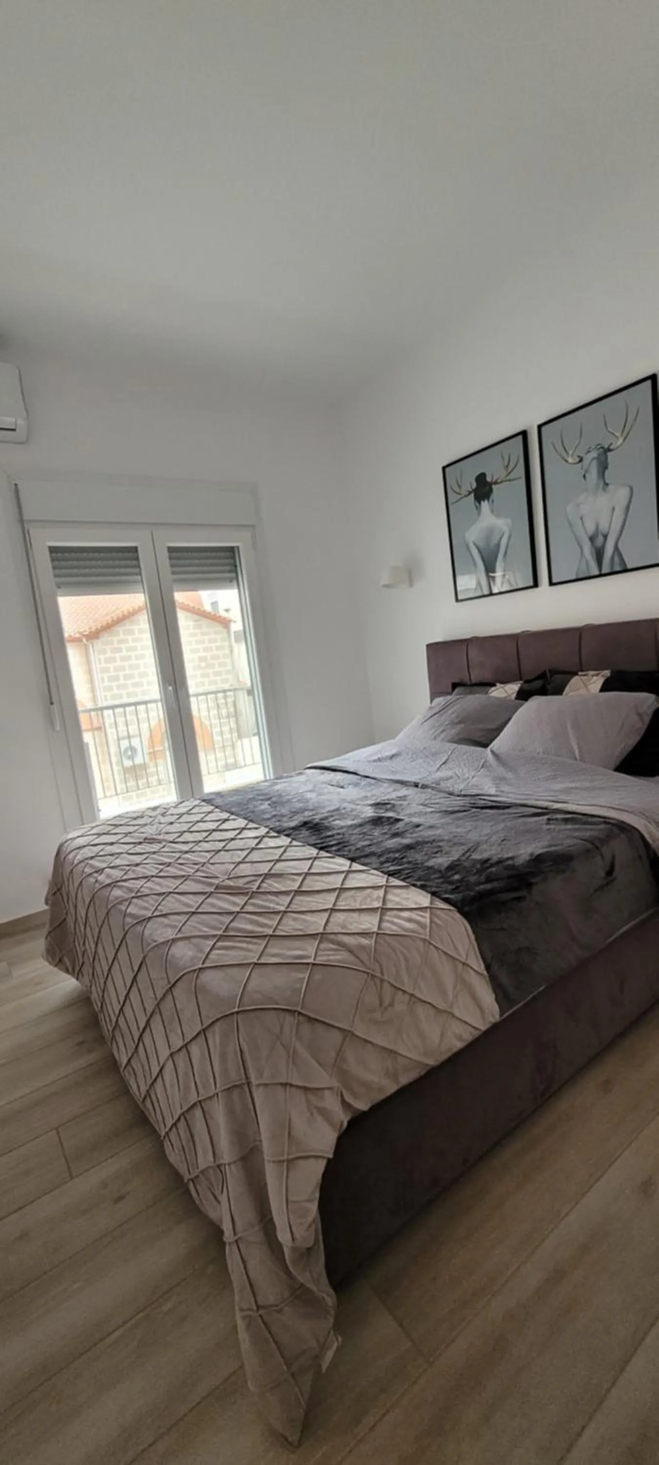Bed in Ivory Lane City Center Luxury Suite