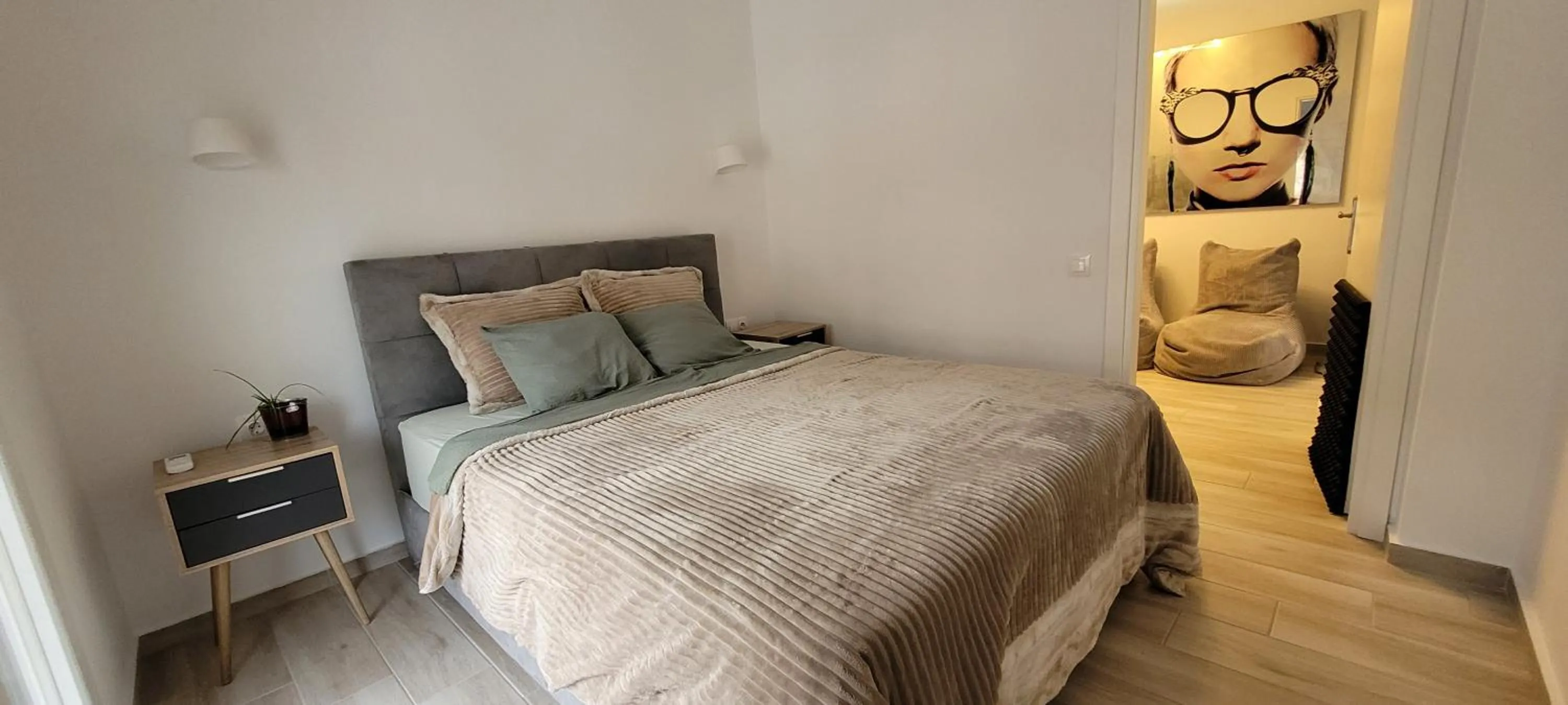 Bed in Ivory Lane City Center Luxury Suite