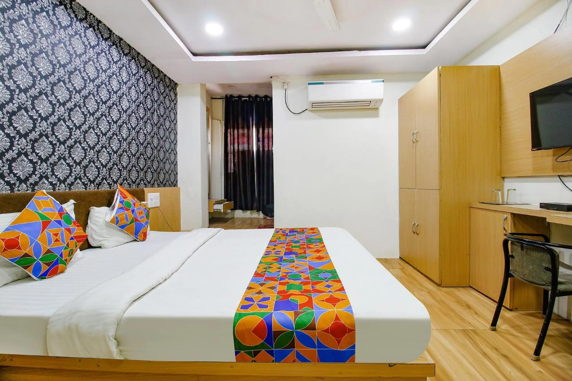 Bed in FabHotel Surbhi