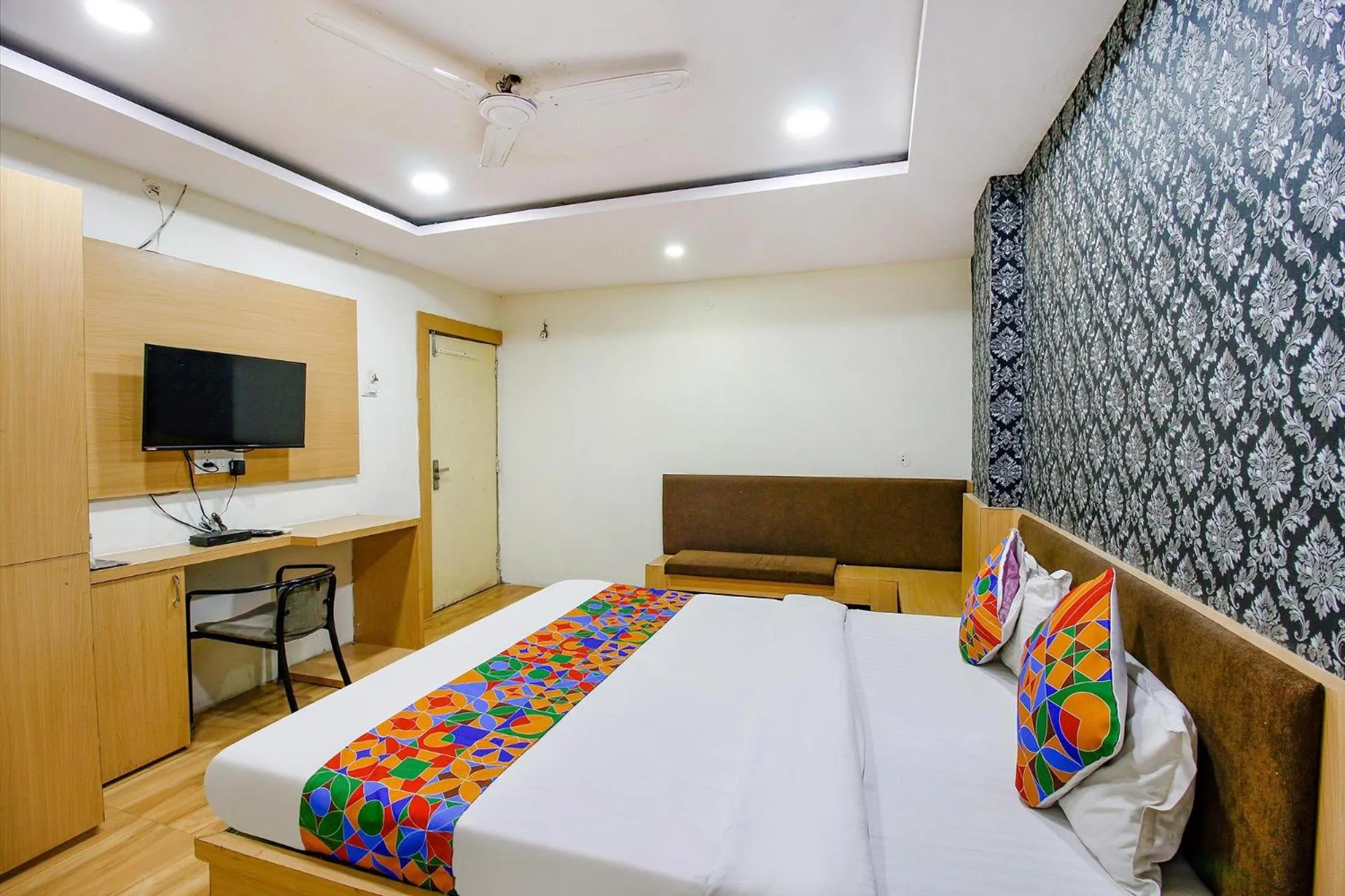 Bed in FabHotel Surbhi